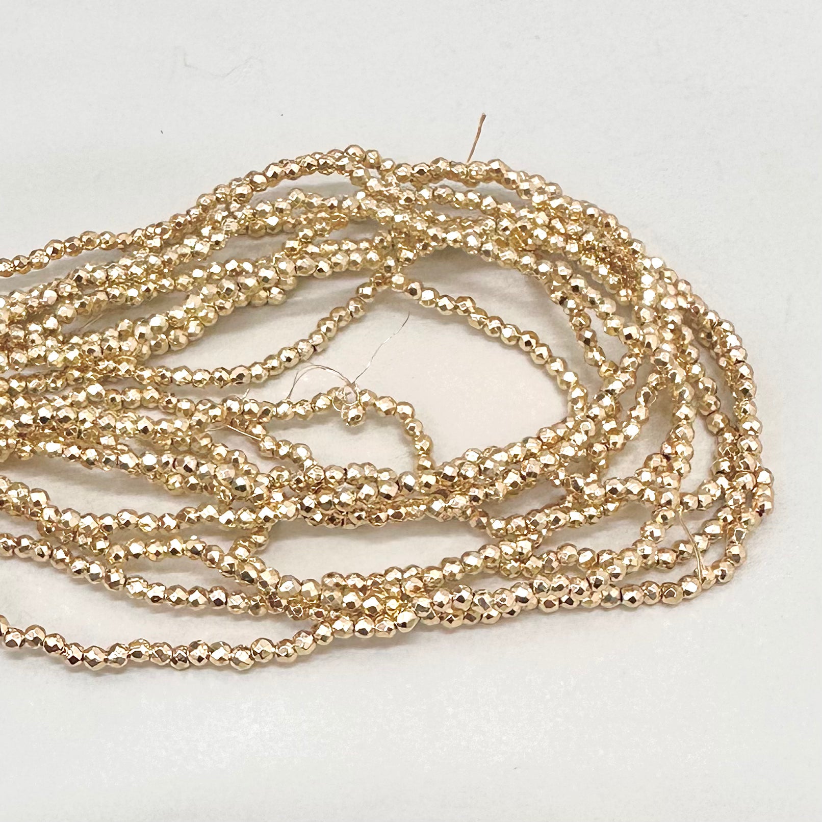 HEMATITA | GOLDROSE FACETADA | 2MM