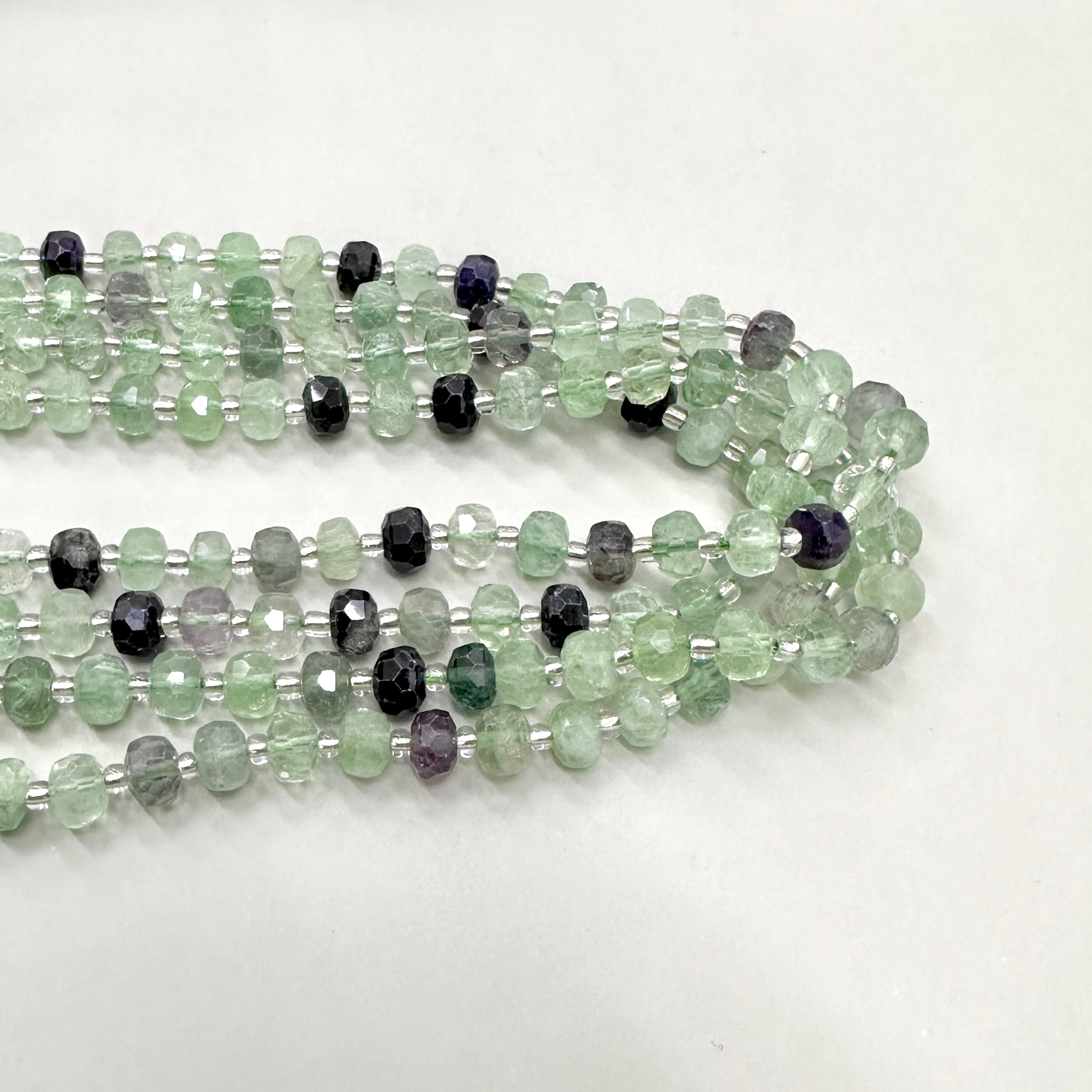 PIEDRA RONDELL FACETADA | FLUORITA