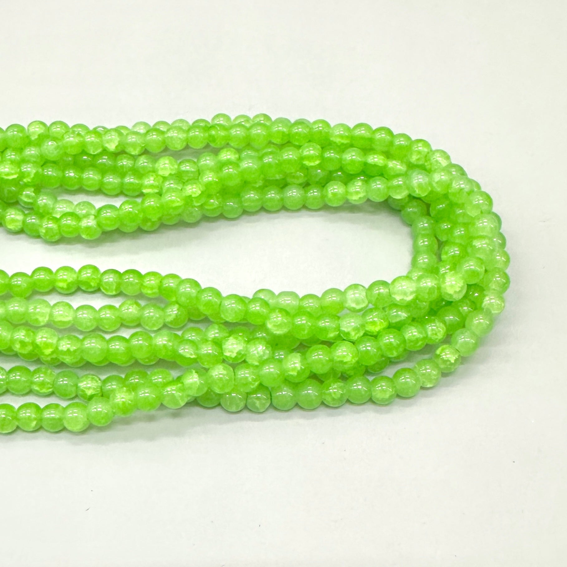 PERLA DE VIDRIO | 6MM | VERDE CLARO TRASLÚCIDO