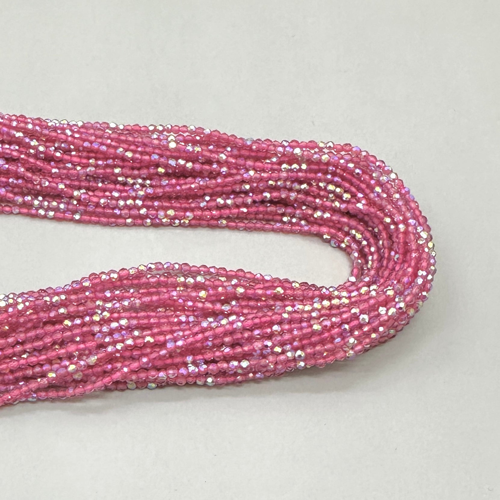 CRISTALES MINERALES FACETADO | FUCSIA CLARO TRASLUCIDO TORNASOL