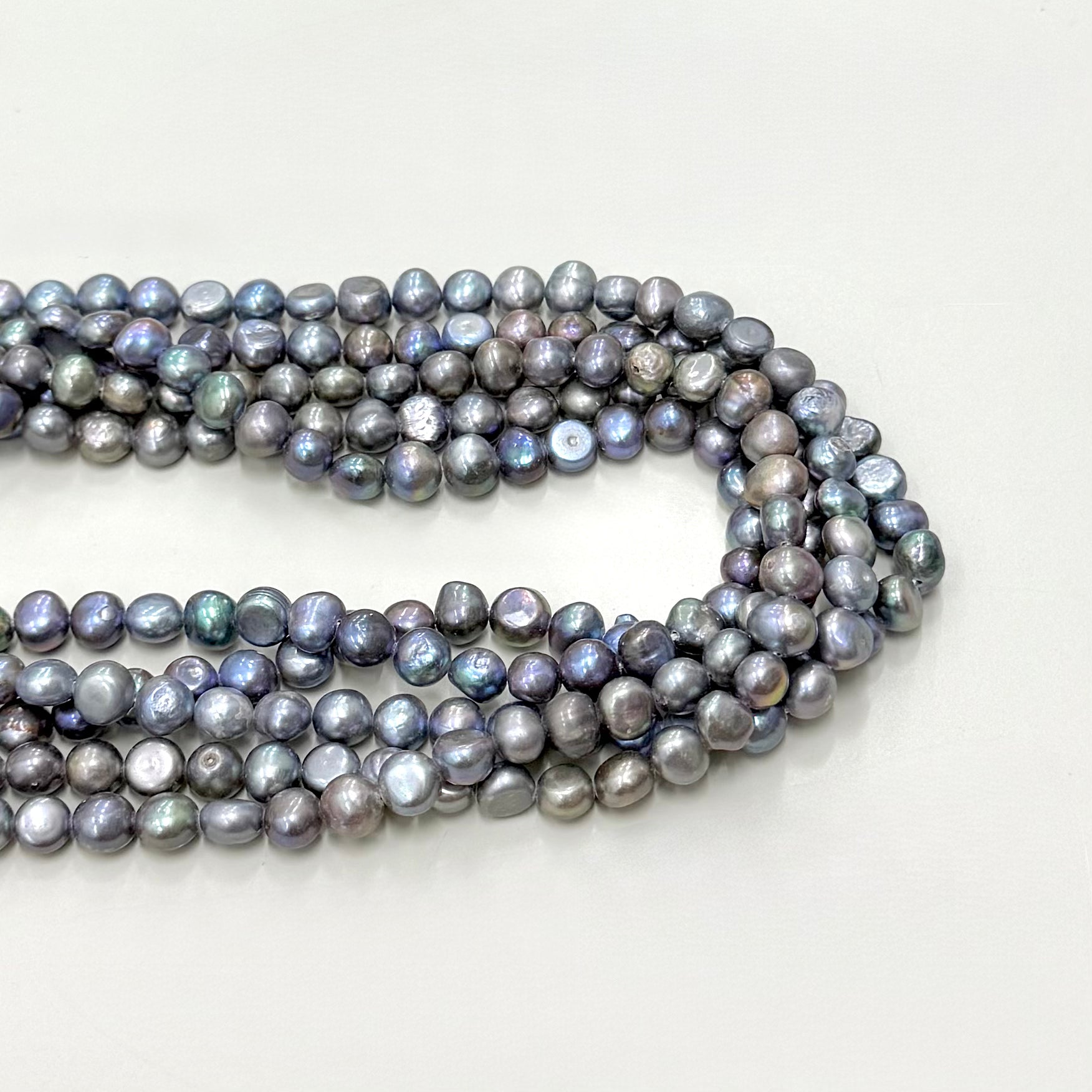 PERLA DE RIO | IRREGULAR APLANADO AZUL TORNASOL