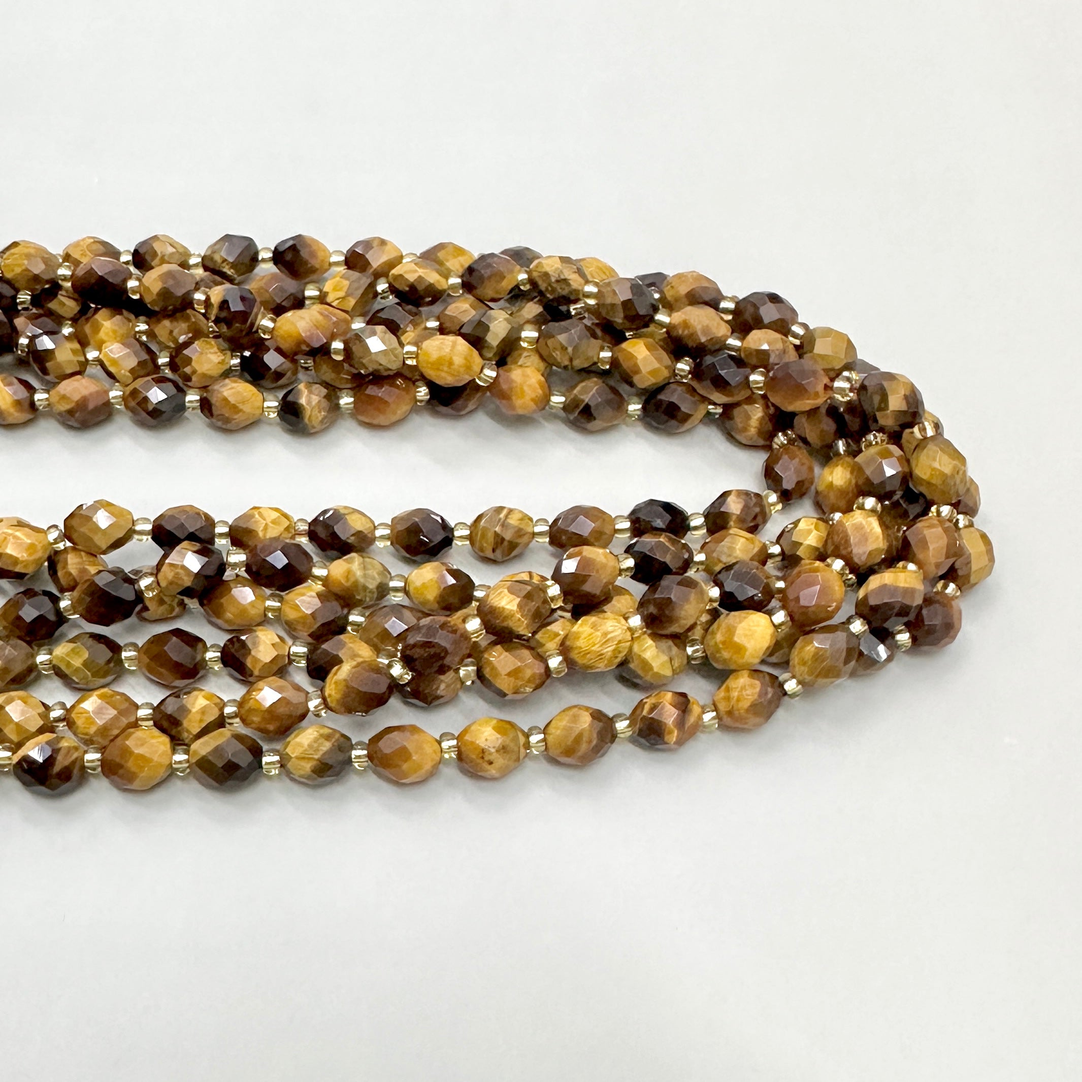 PIEDRA OVALADA FACETADA | OJO TIGRE