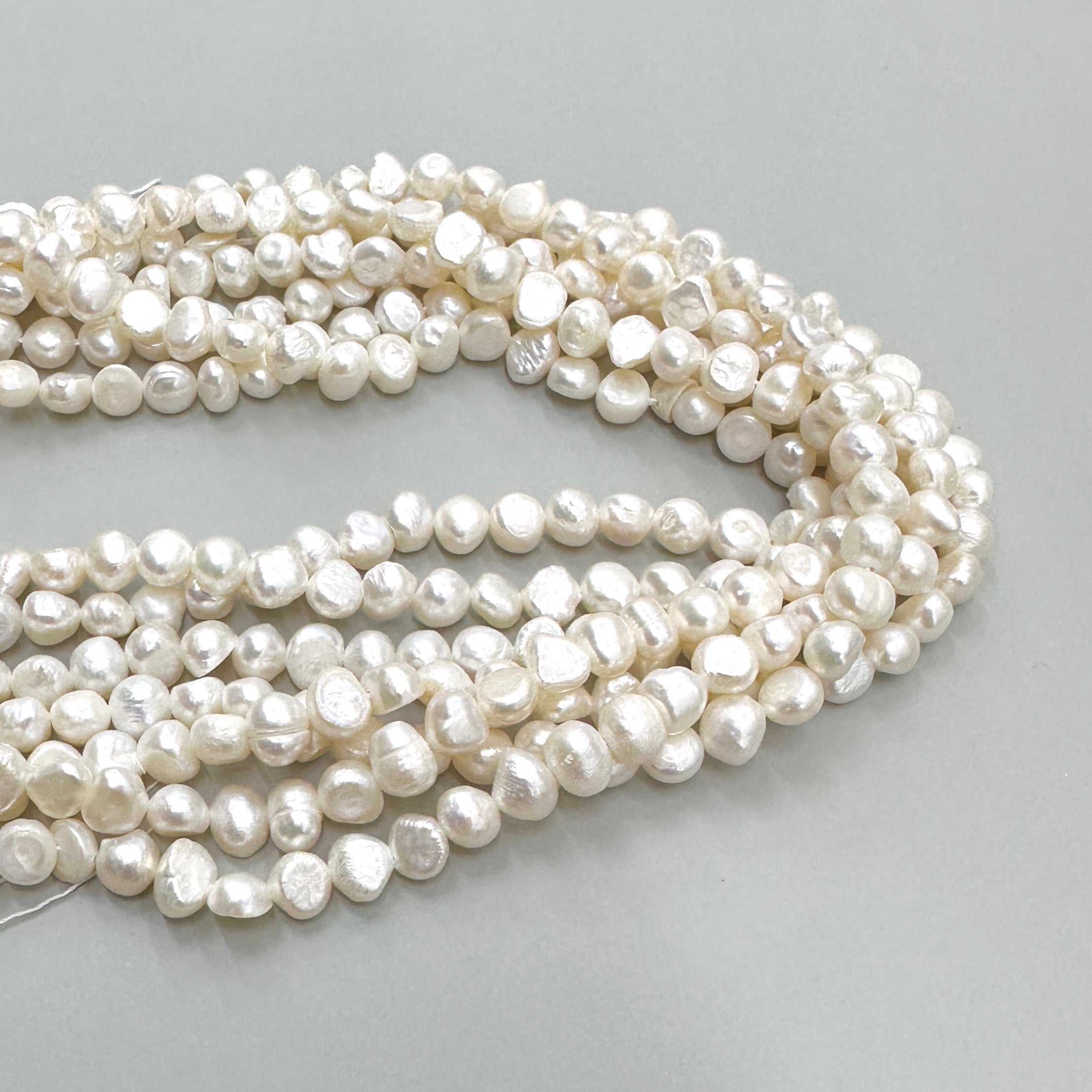 PERLA DE RÍO IRREGULAR APLANADA | 7MM