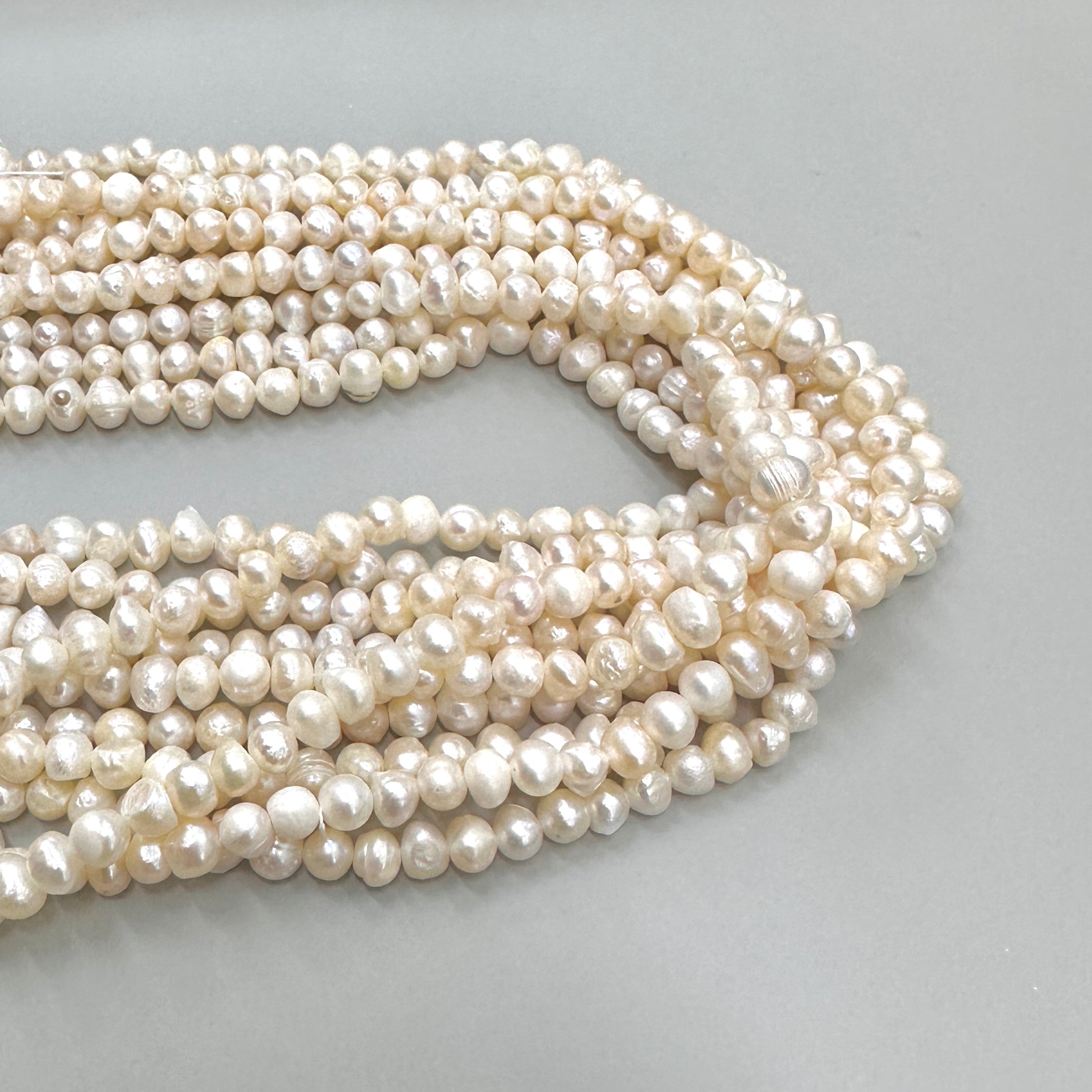 PERLA DE RÍO IRREGULAR BLANCA | 6MM