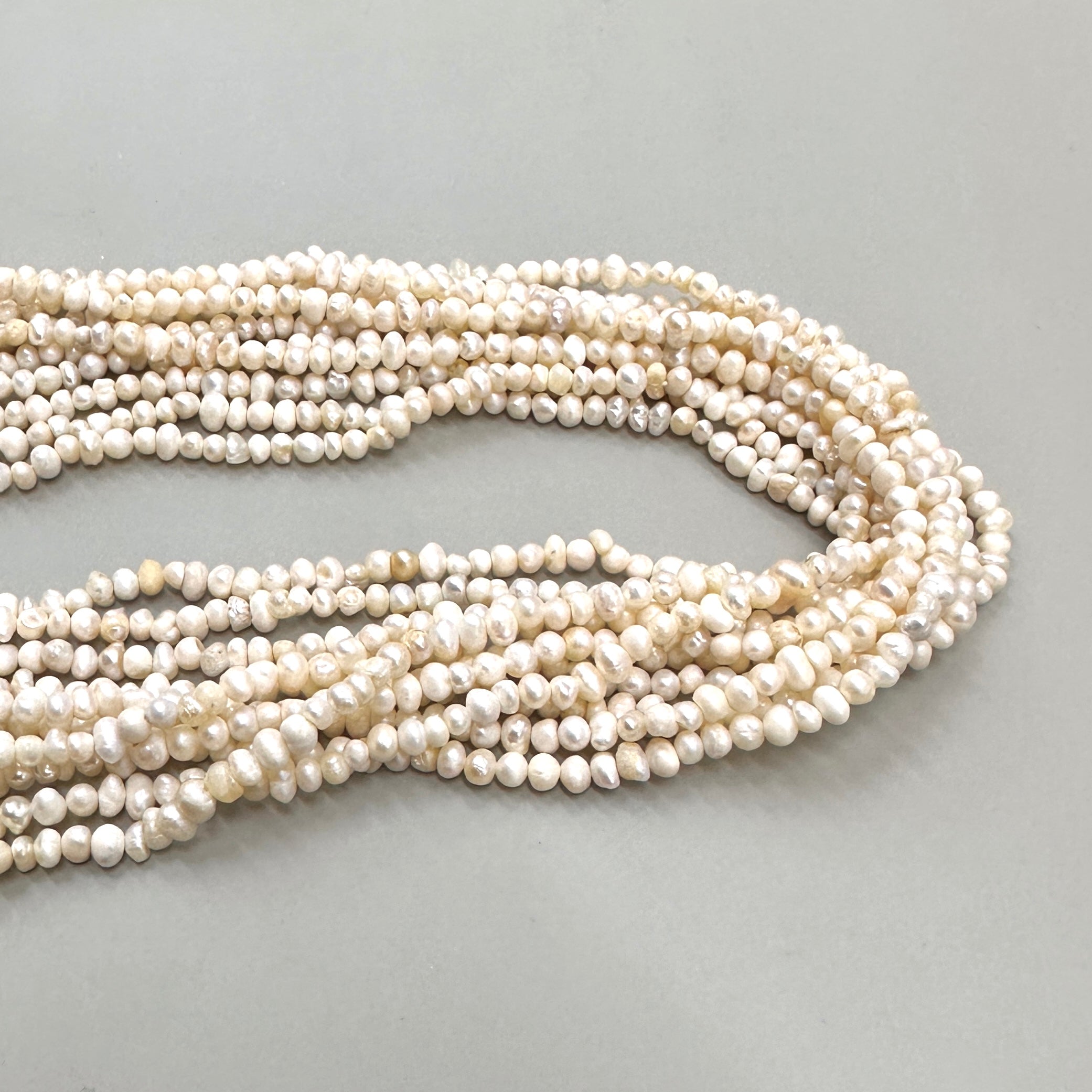 PERLA DE RÍO IRREGULAR MIX CREMA | 3MM