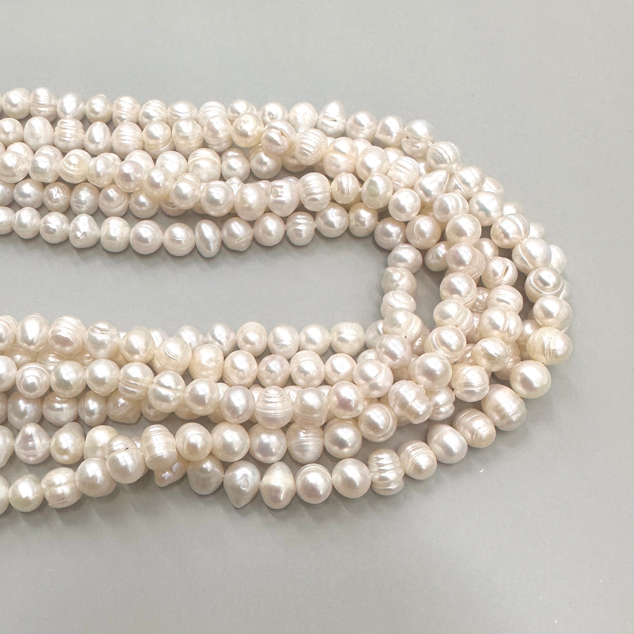 PERLA DE RIO REDONDA IRREGULAR | 7MM