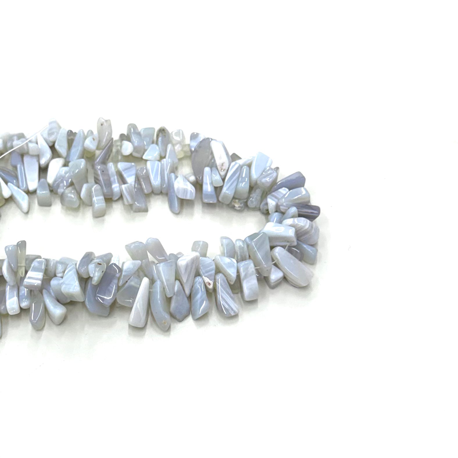 PIEDRA DE DISEÑO | AGATA GRIS | DAGA IRREGULAR TRIANGULAR | 10X6MM