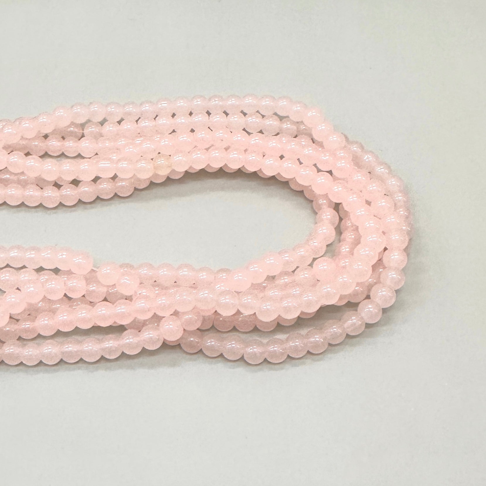 PERLA DE VIDRIO | 6MM | ROSA DAMASCO TRASLÚCIDO