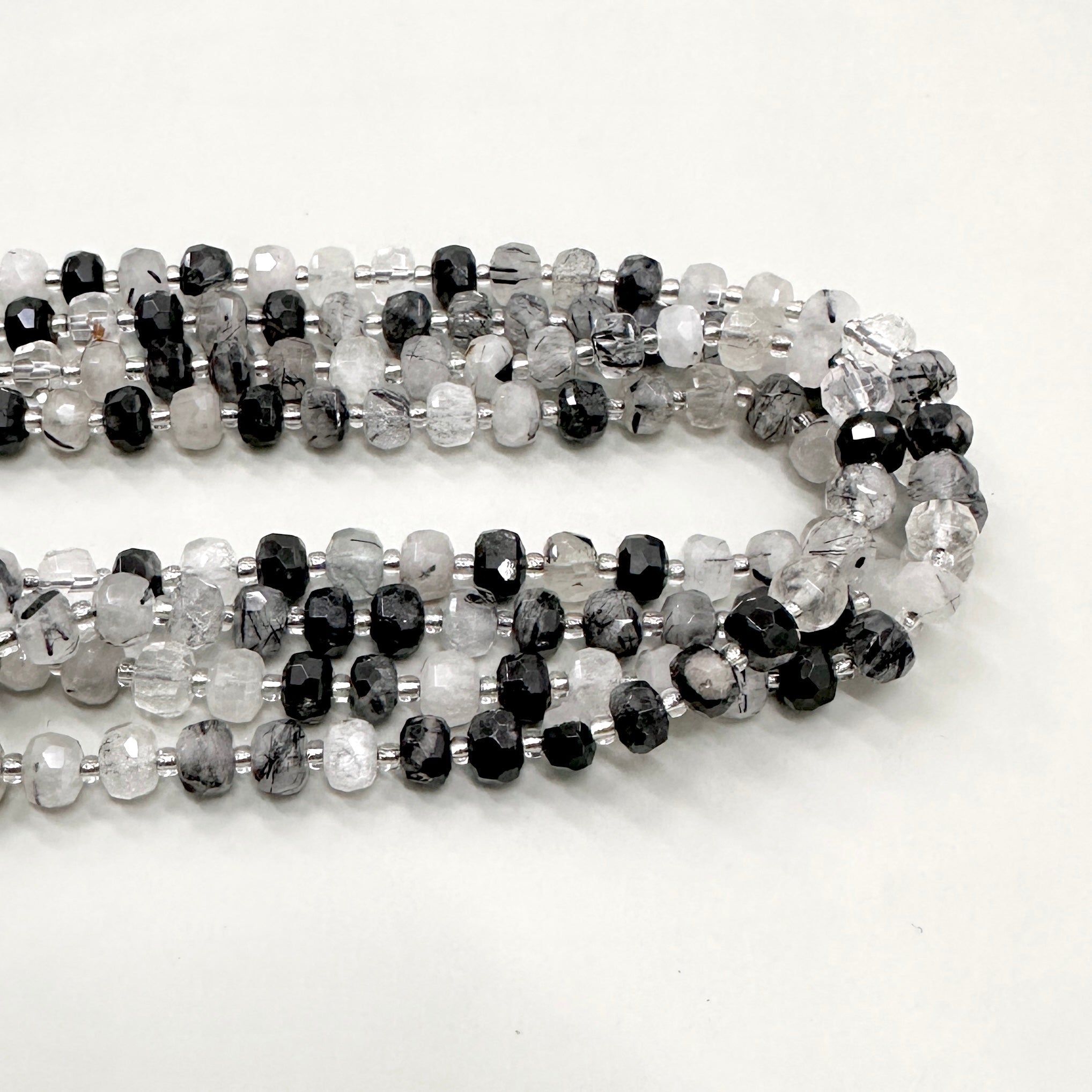 PIEDRA RONDELL FACETADA | CUARZO TURMALINADO