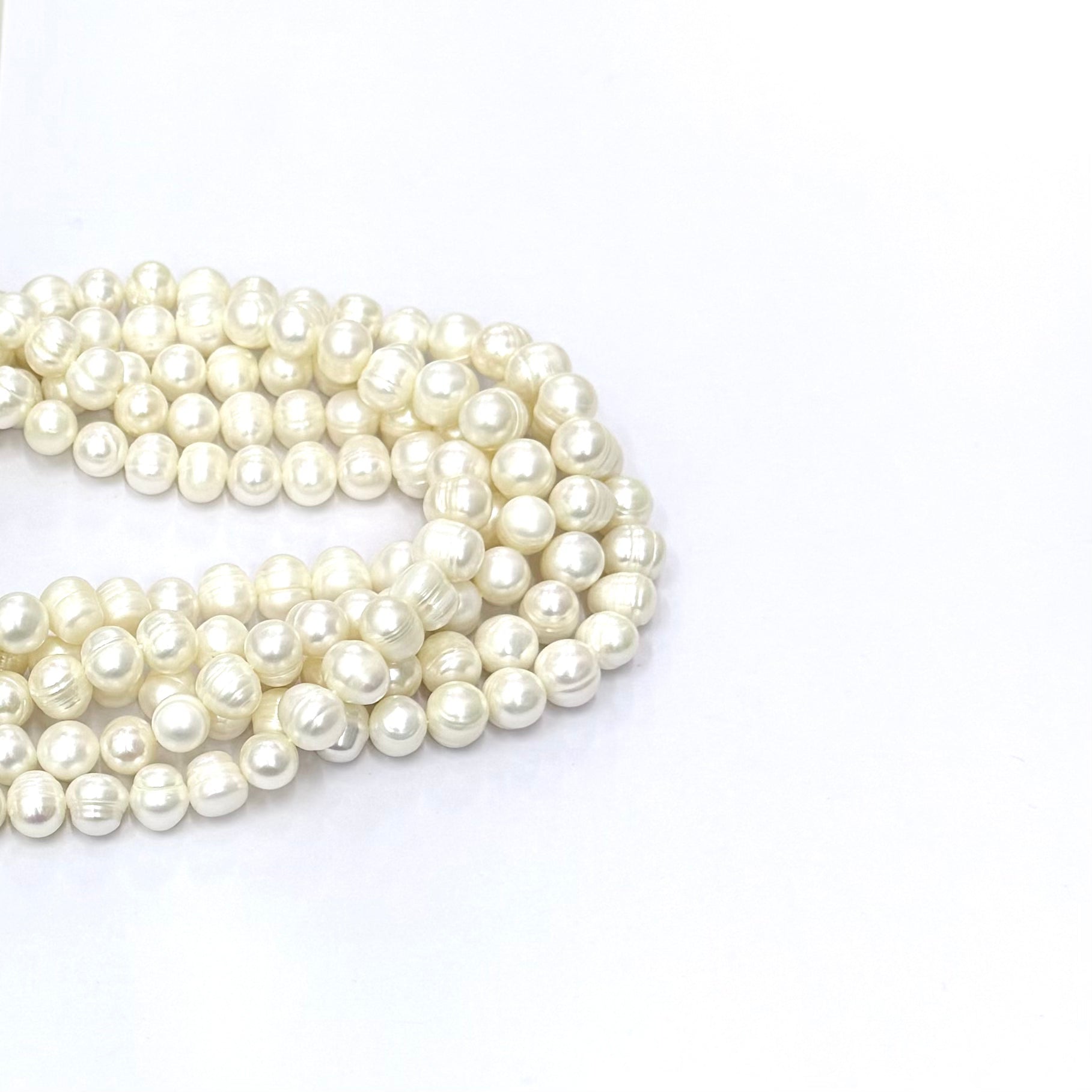 PERLA DE RIO | CREMA | OVALO IRREGULAR 9X11MM