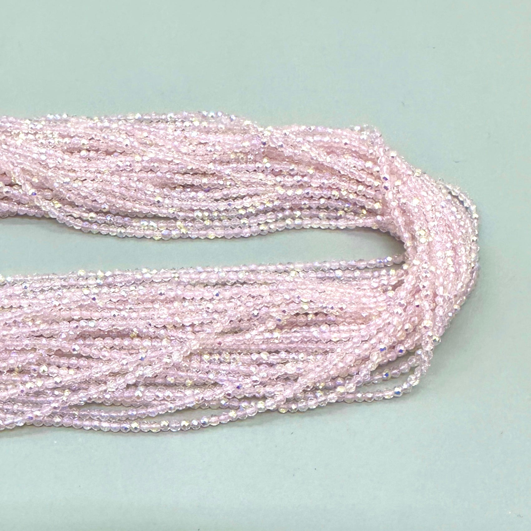 CRISTALES MINERALES FACETADO | ROSA CLARO TRASLUCIDO TORNASOL