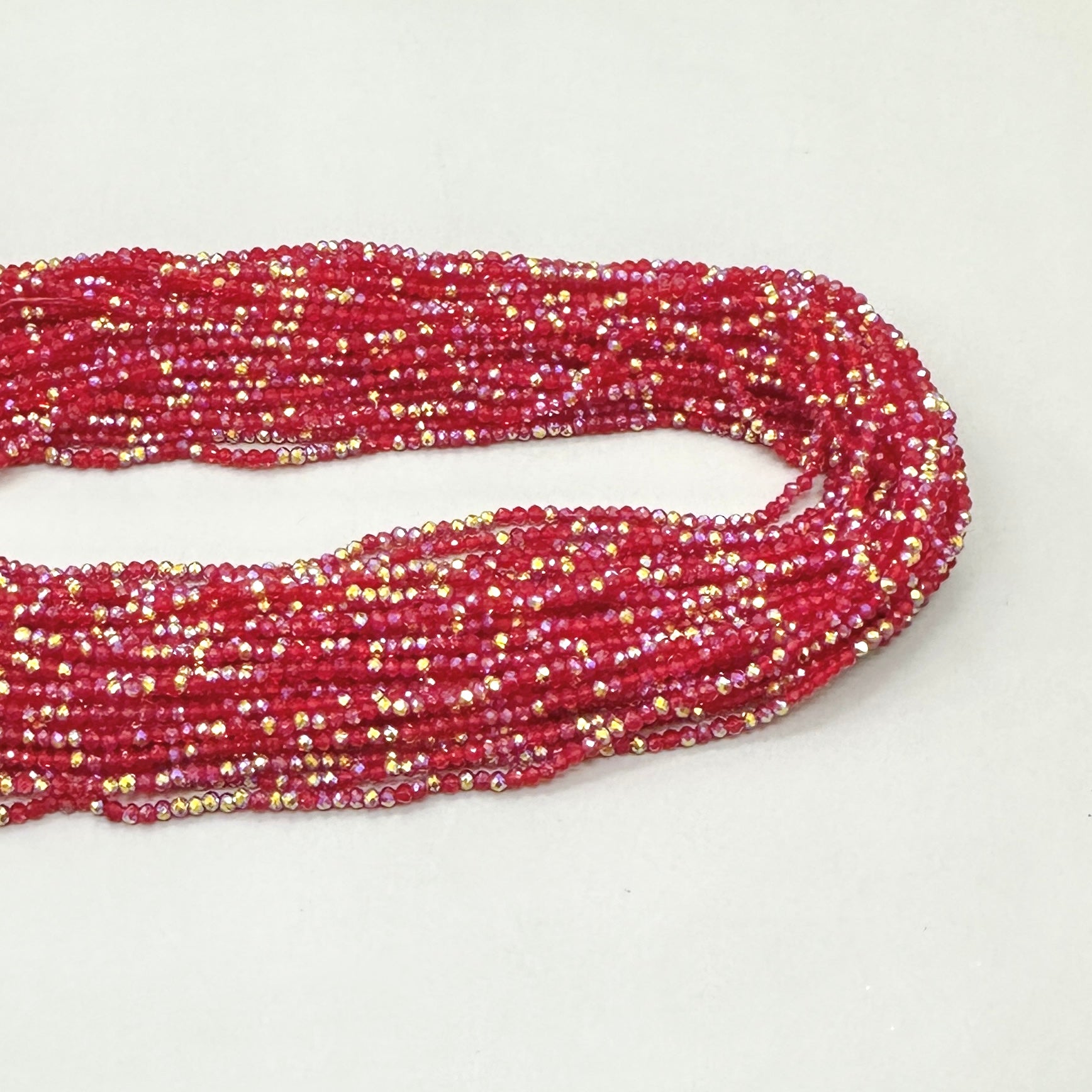 CRISTALES MINERALES FACETADO | ROJO TRASLUCIDO TORNASOL