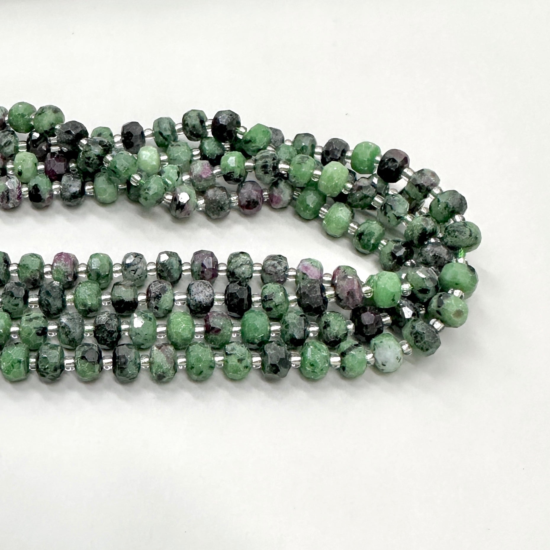 PIEDRA RONDELL FACETADA | ZOISITA RUBI