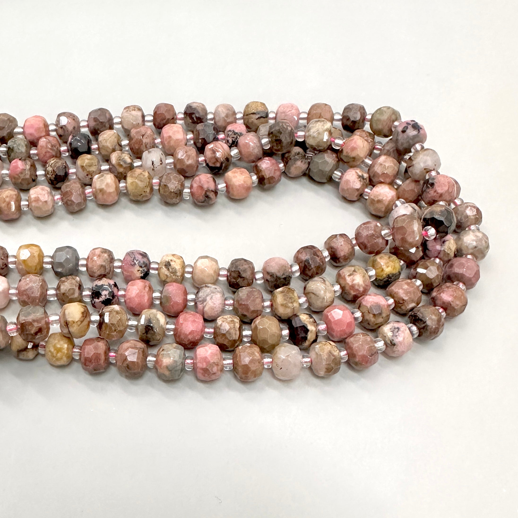 PIEDRA RONDELL FACETADA | RODONITA