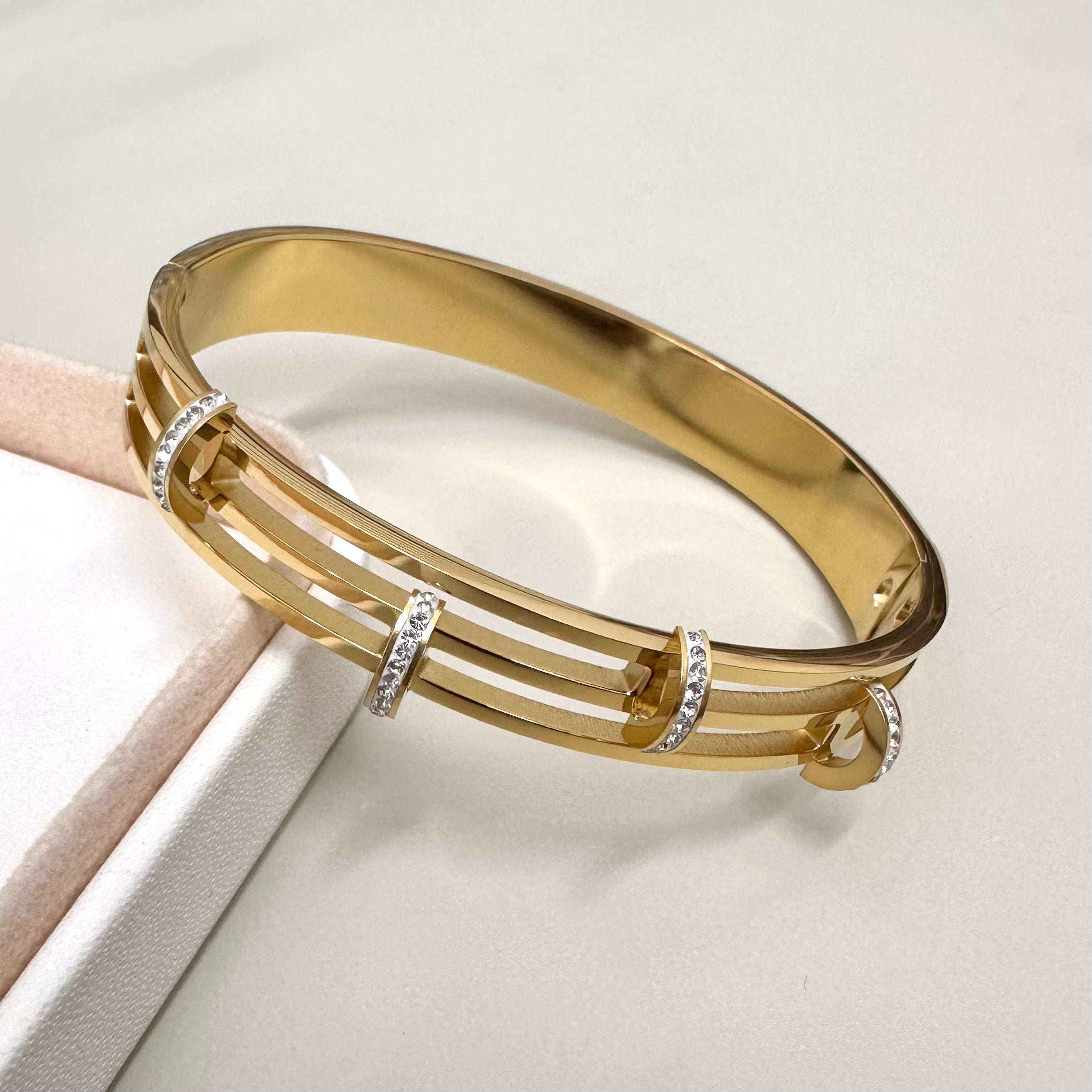 PULSERA RIGIDA | TRIPLE CON 4 ARCOS CIRCONES