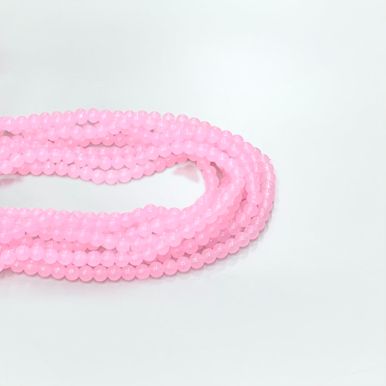 PERLA DE VIDRIO | 6MM | ROSADO FLUOR TRASLUCIDO