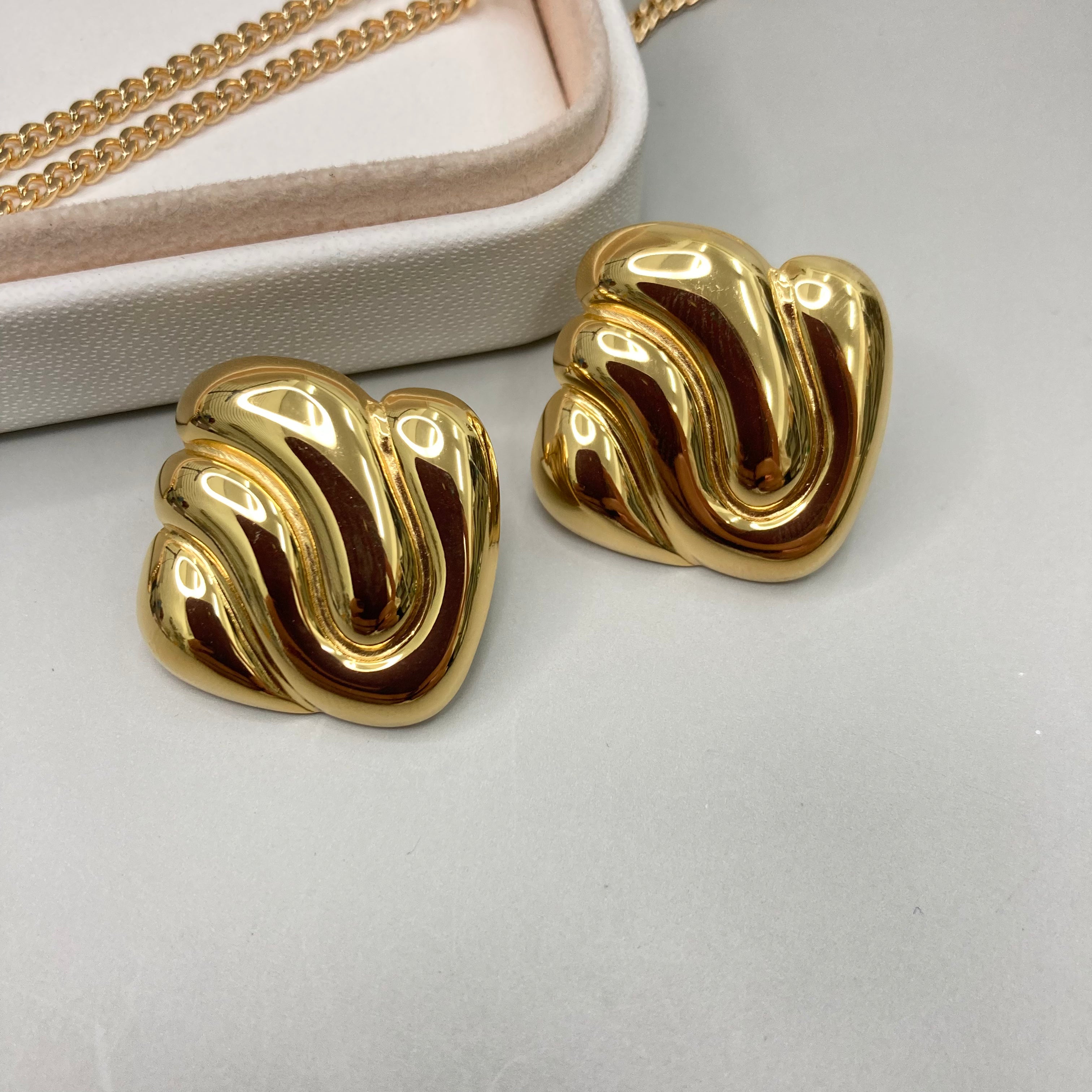 AROS | ROMBO CON LINEAS ONDULADAS
