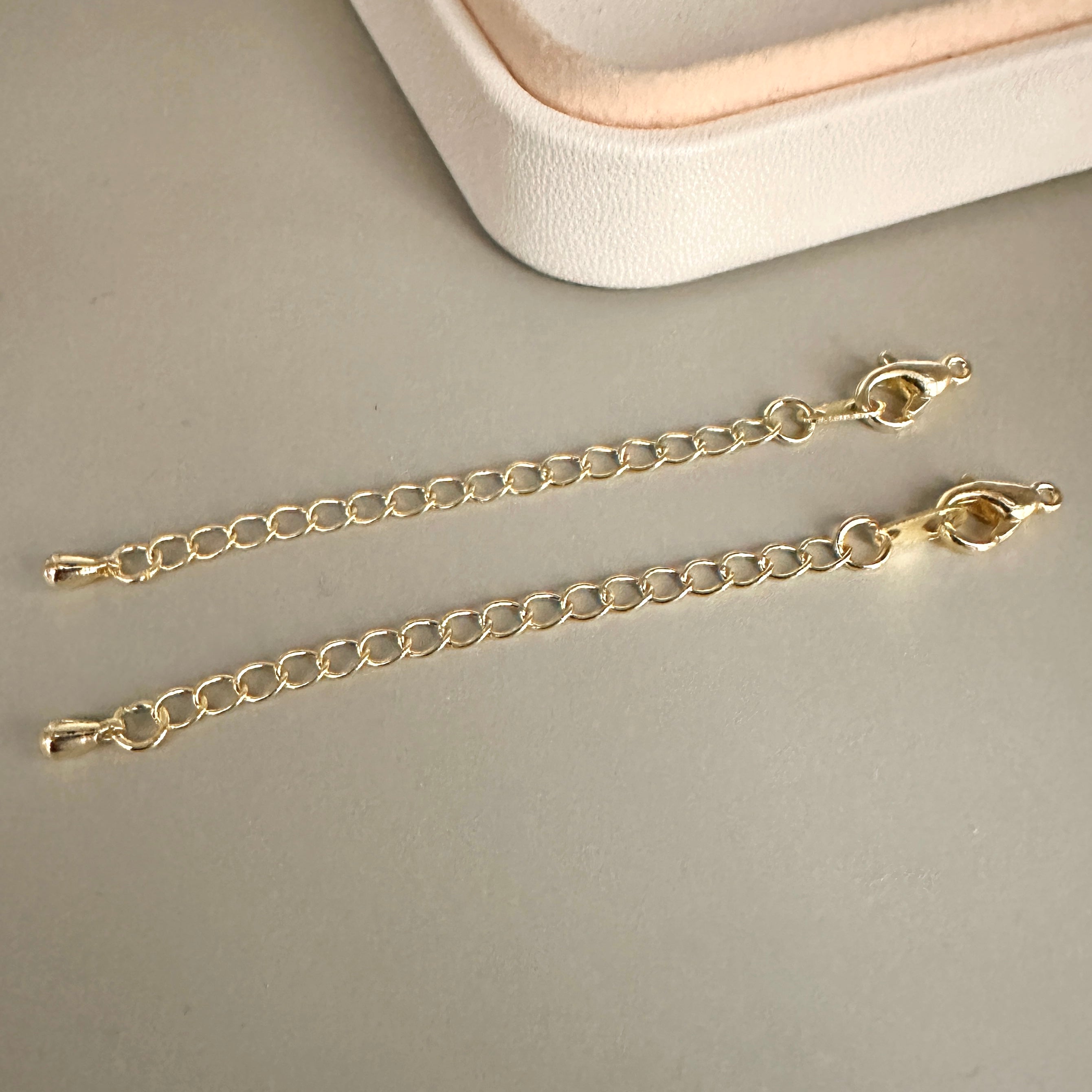 BROCHE CON CADENA DE EXTENSION