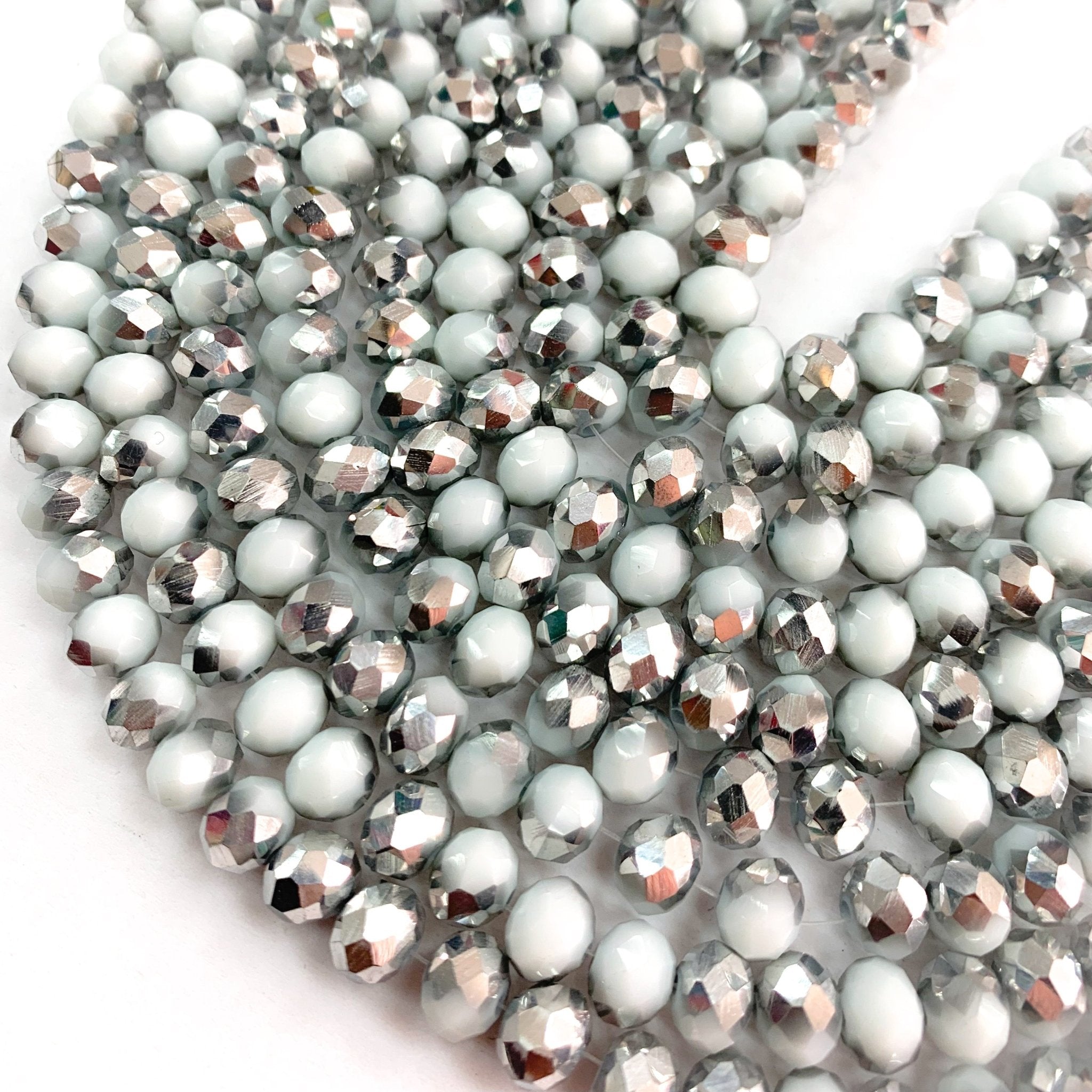 CRISTAL CHATO | 8 MM | BICOLOR METAL PLATEADO Y BLANCO