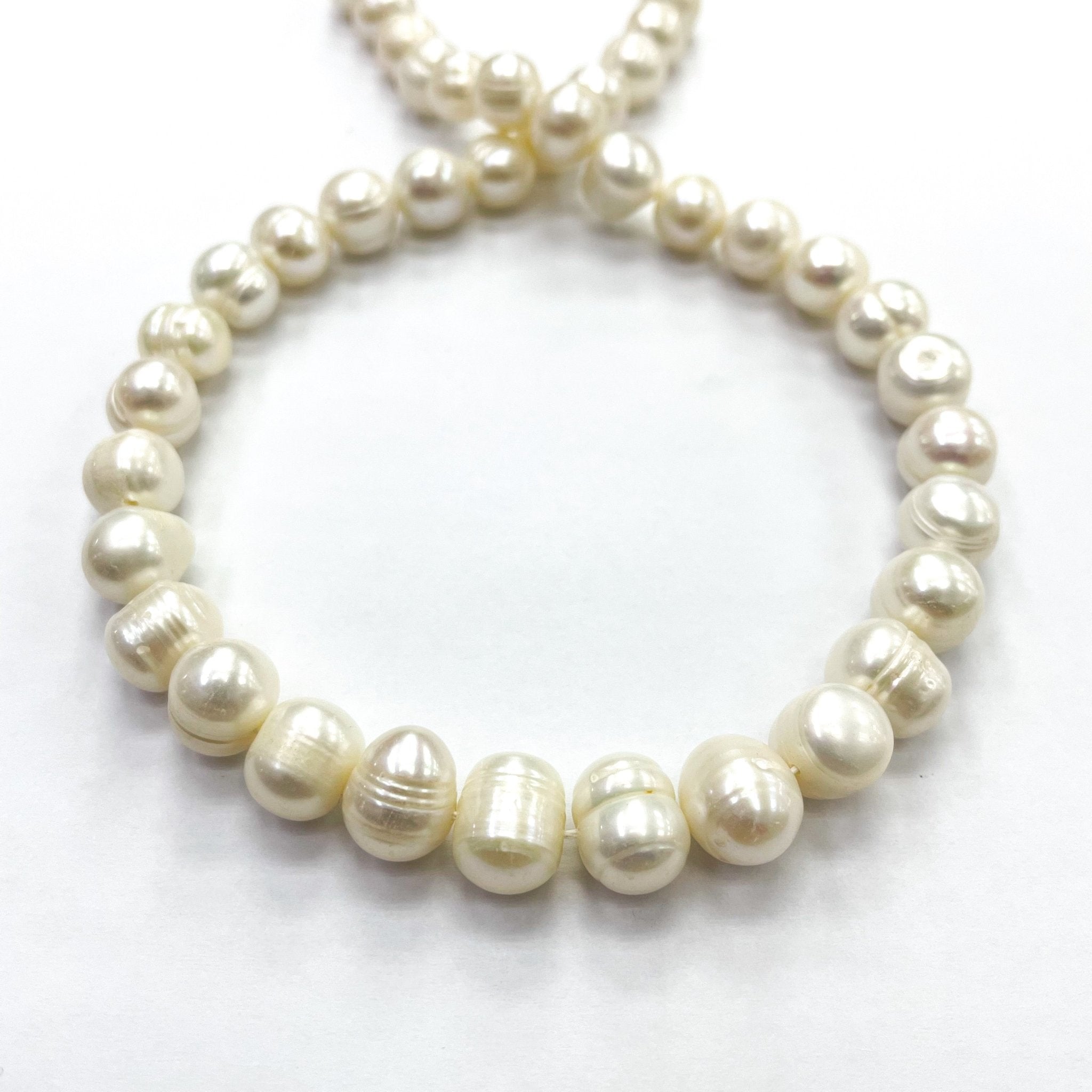 PERLA DE RÍO IRREGULAR BLANCO | 10MM