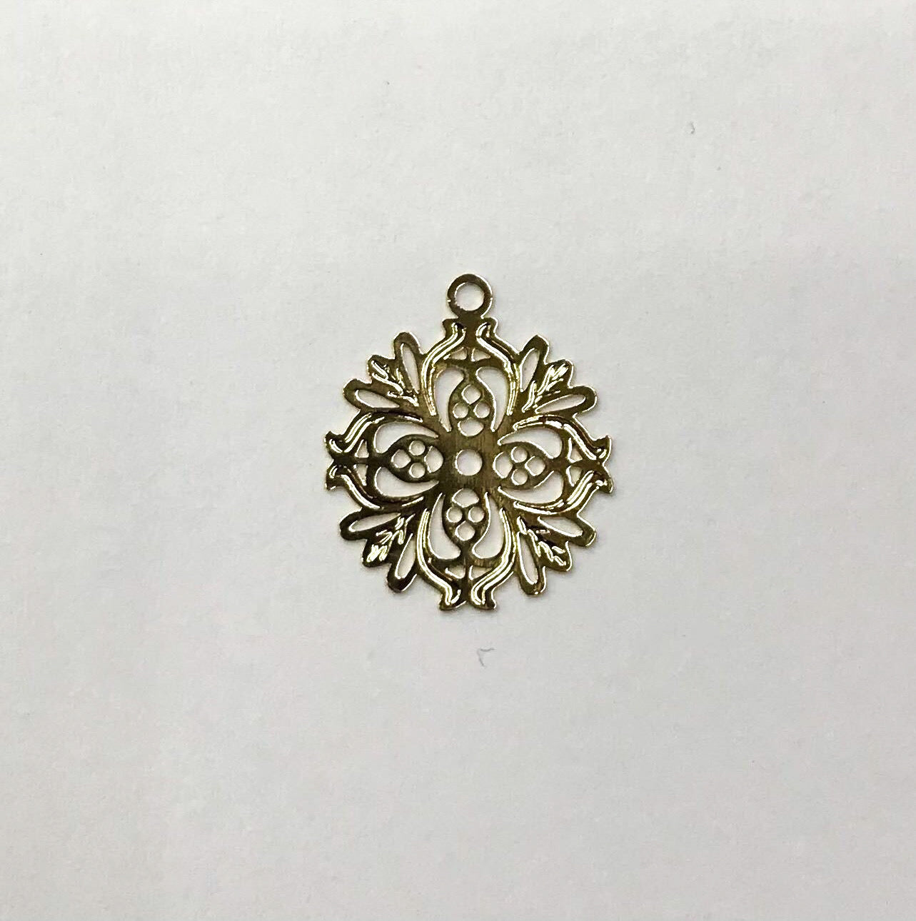 CRUZ CON FLOR | BAÑO DE ORO 18K | 16MM