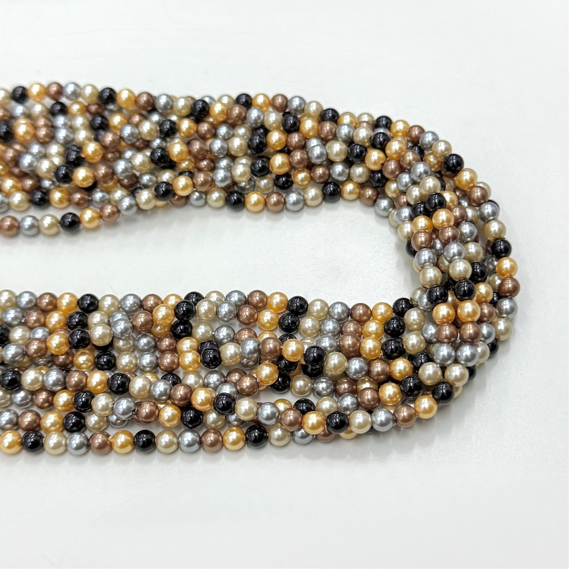 PERLA SHELL | 4MM | MIX GRIS DORADO NEGRO Y CAFE