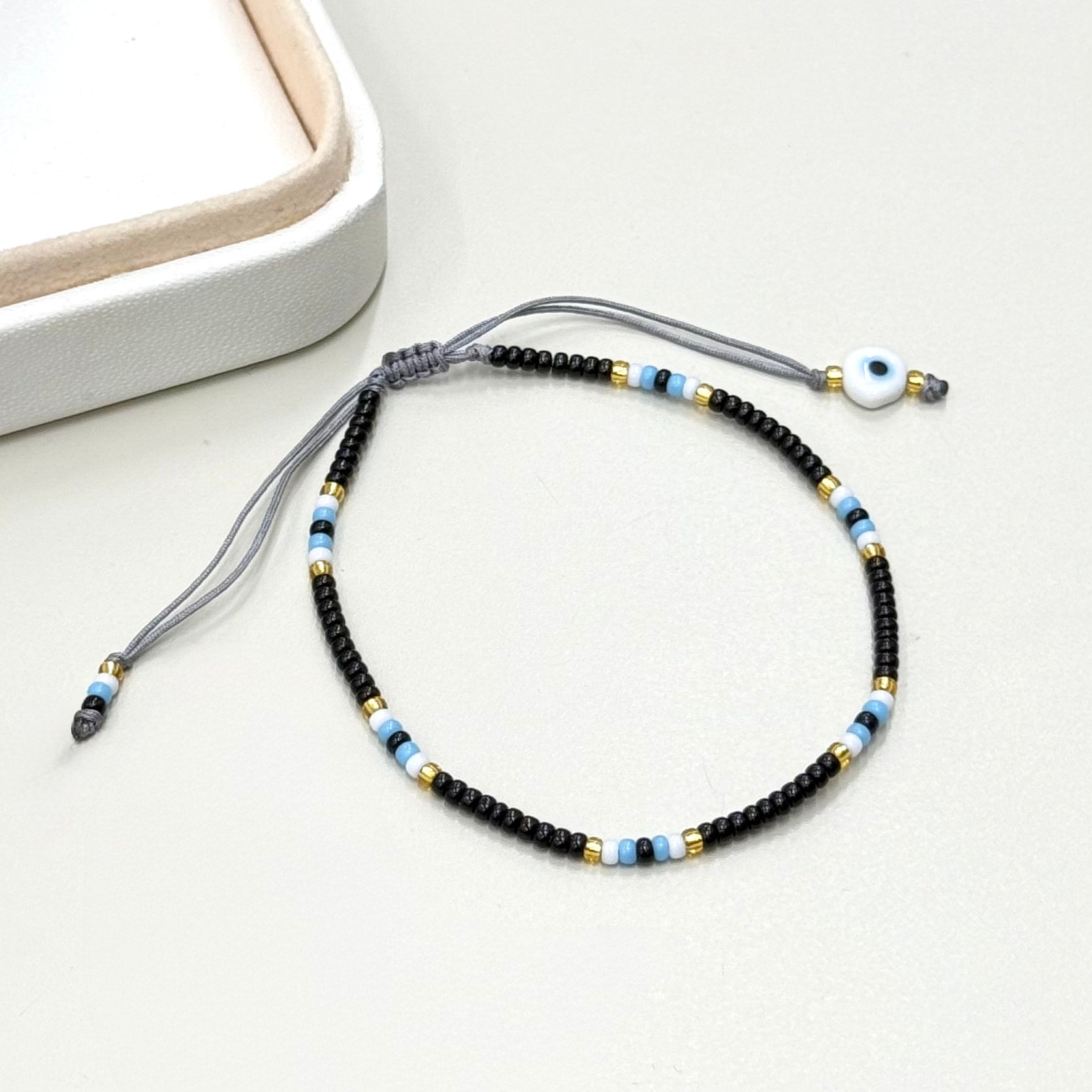 PULSERA NEGRA | OJITO | LUNAM