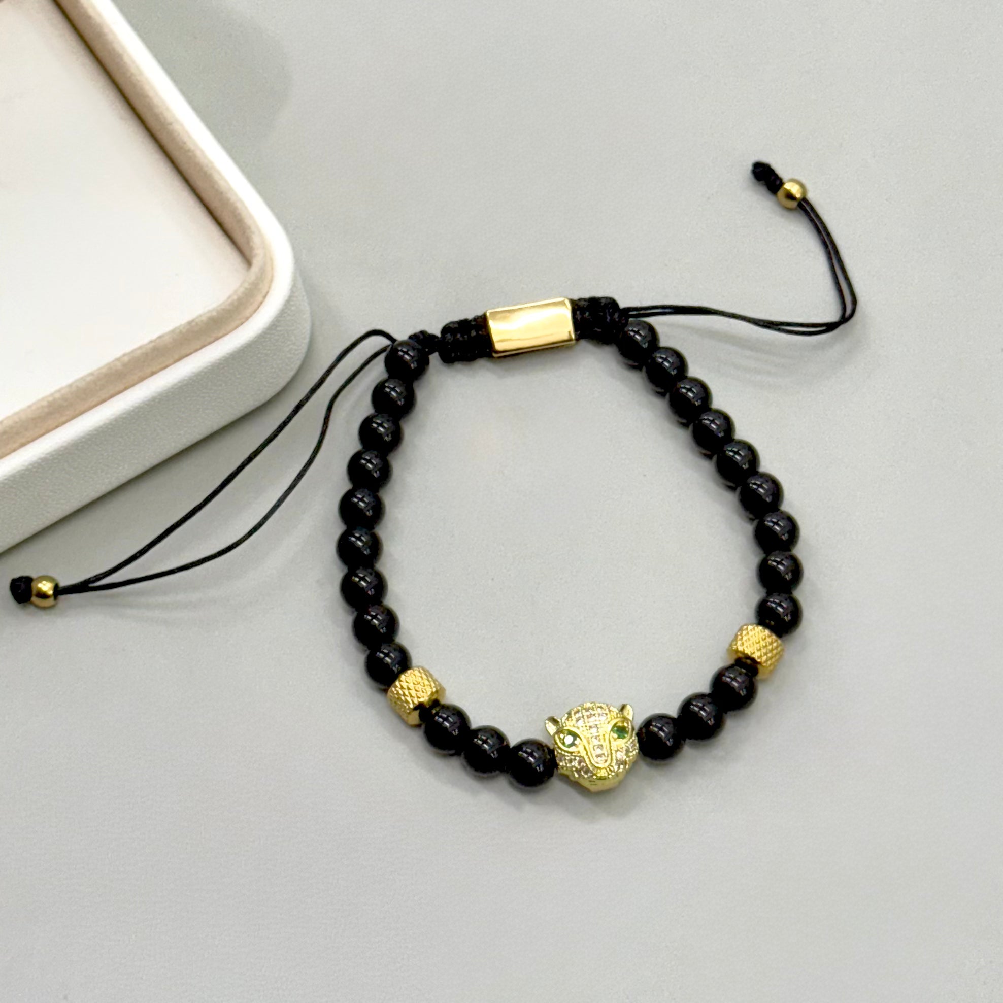 PULSERA HILO | CABEZA LEOPARDO OJOS VERDES