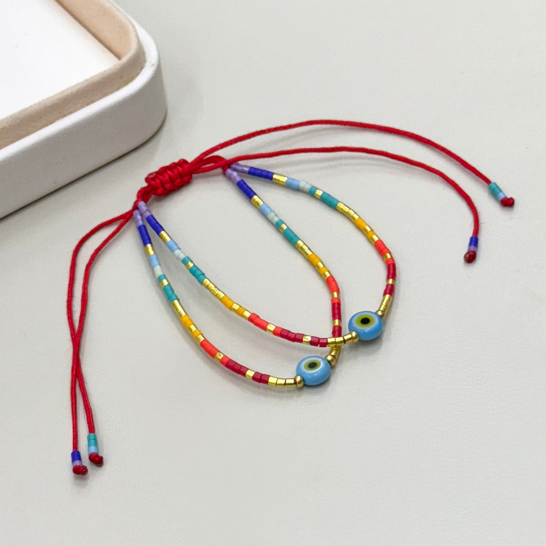 PULSERA DOBLE MIX COLORES  OJITO | LUNAM