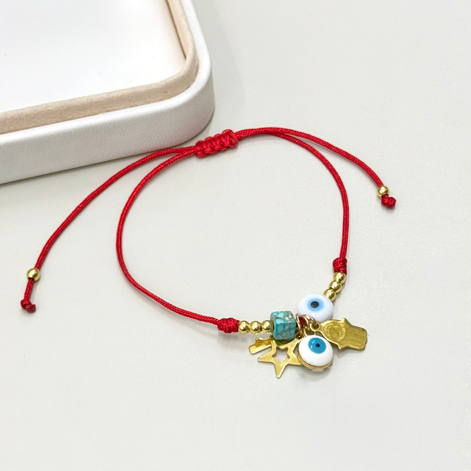 PULSERA ROJA DIJES TURQUESA Y OJITO | LUNAM