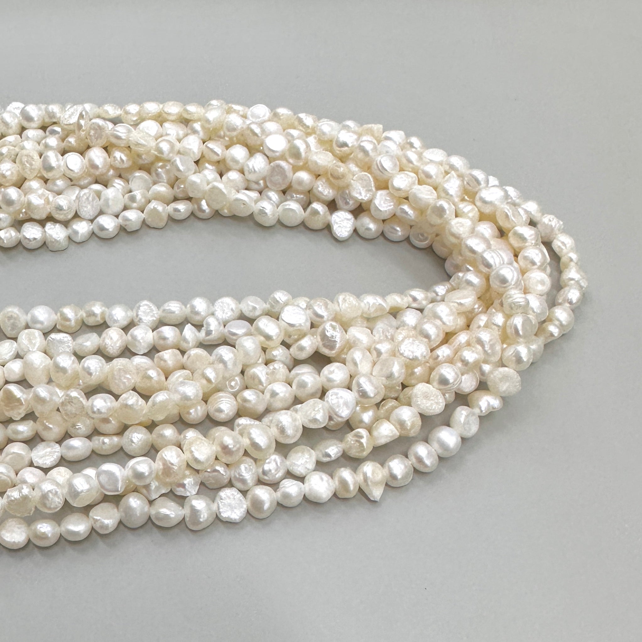 PERLA DE RÍO IRREGULAR APLANADA | 6MM