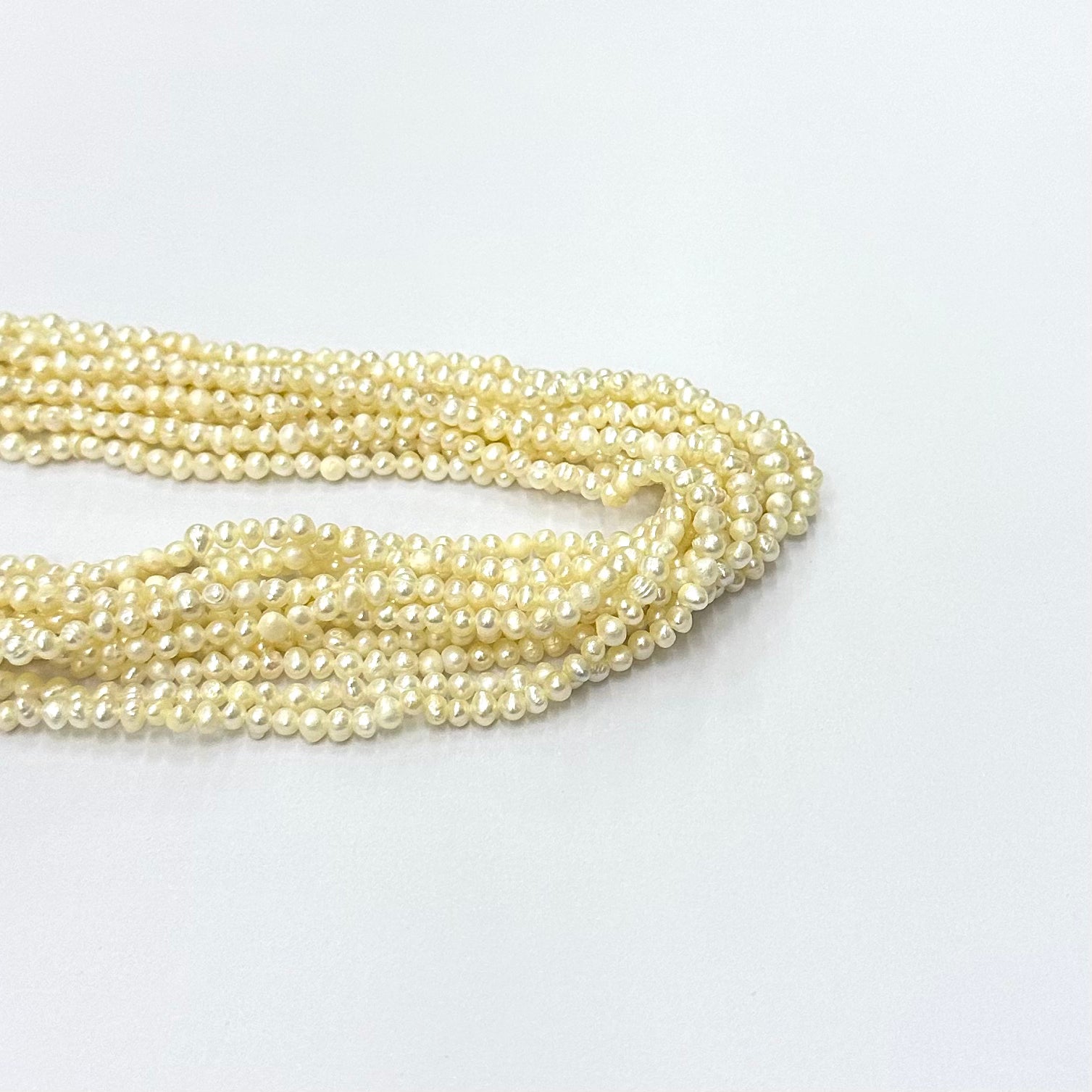 PERLA DE RÍO IRREGULAR CREMA MARFIL | 3.5MM