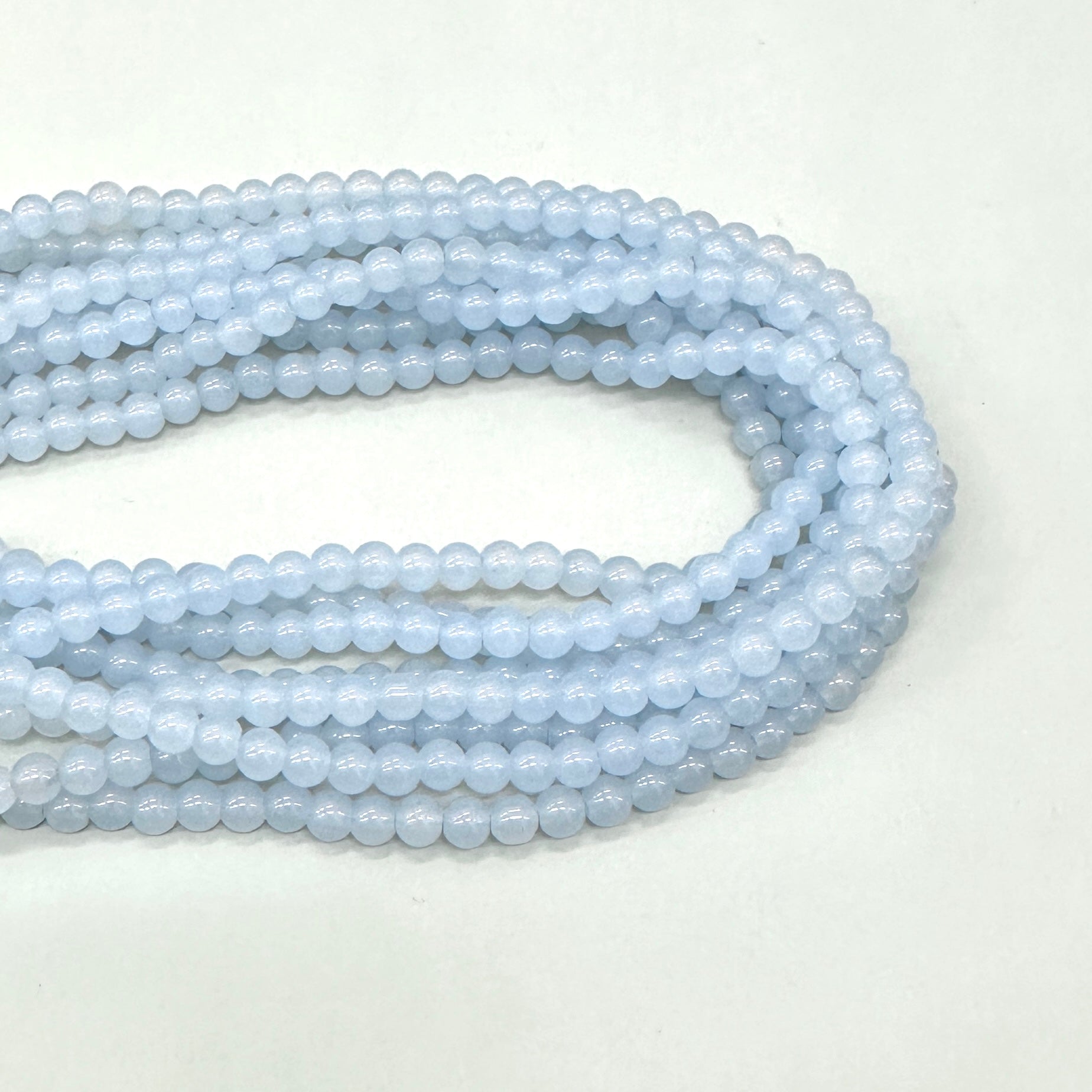 PERLA DE VIDRIO | 6MM | LAVANDA CLARO TRASLÚCIDO