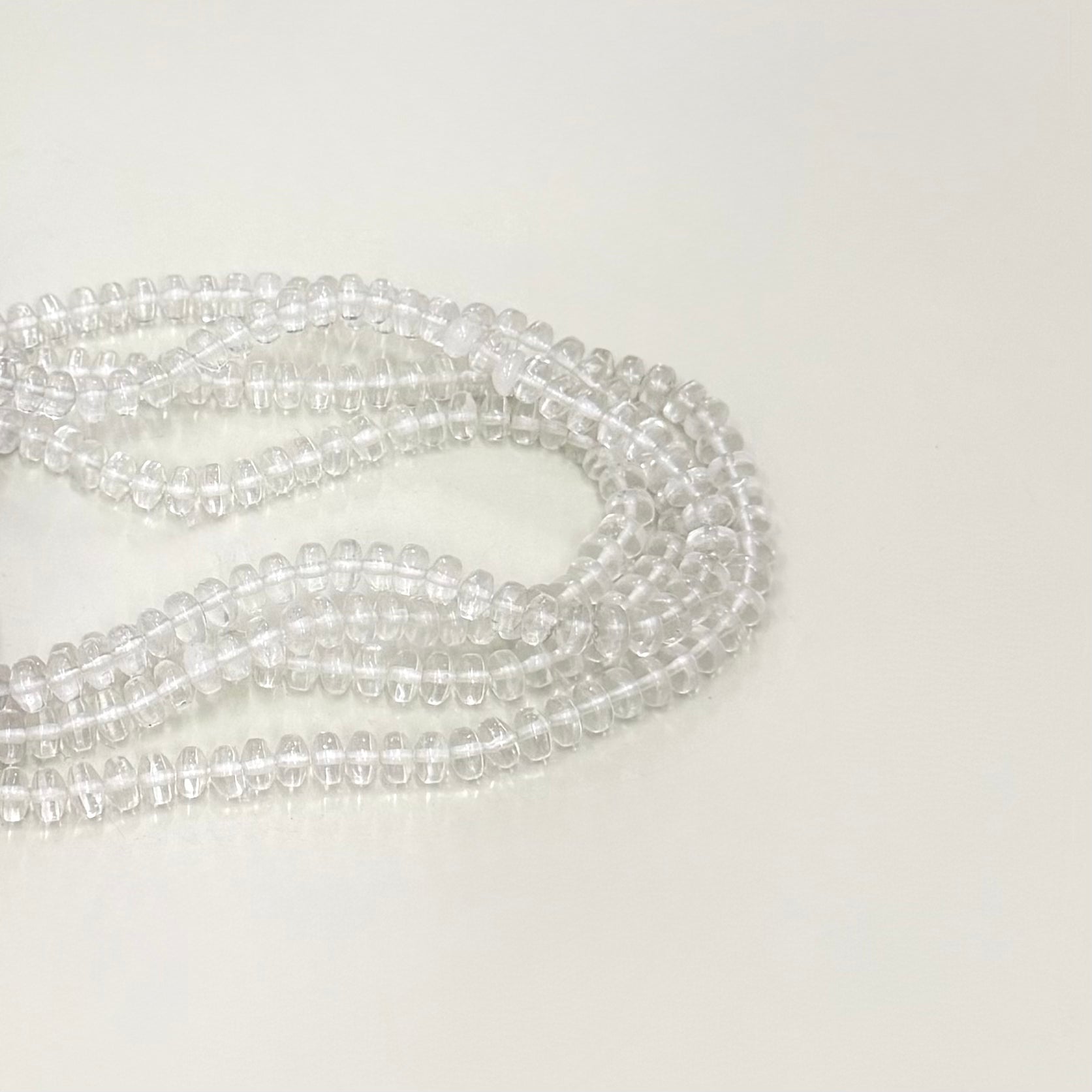 CUARZO CRISTAL RONDELL LISO 6MM