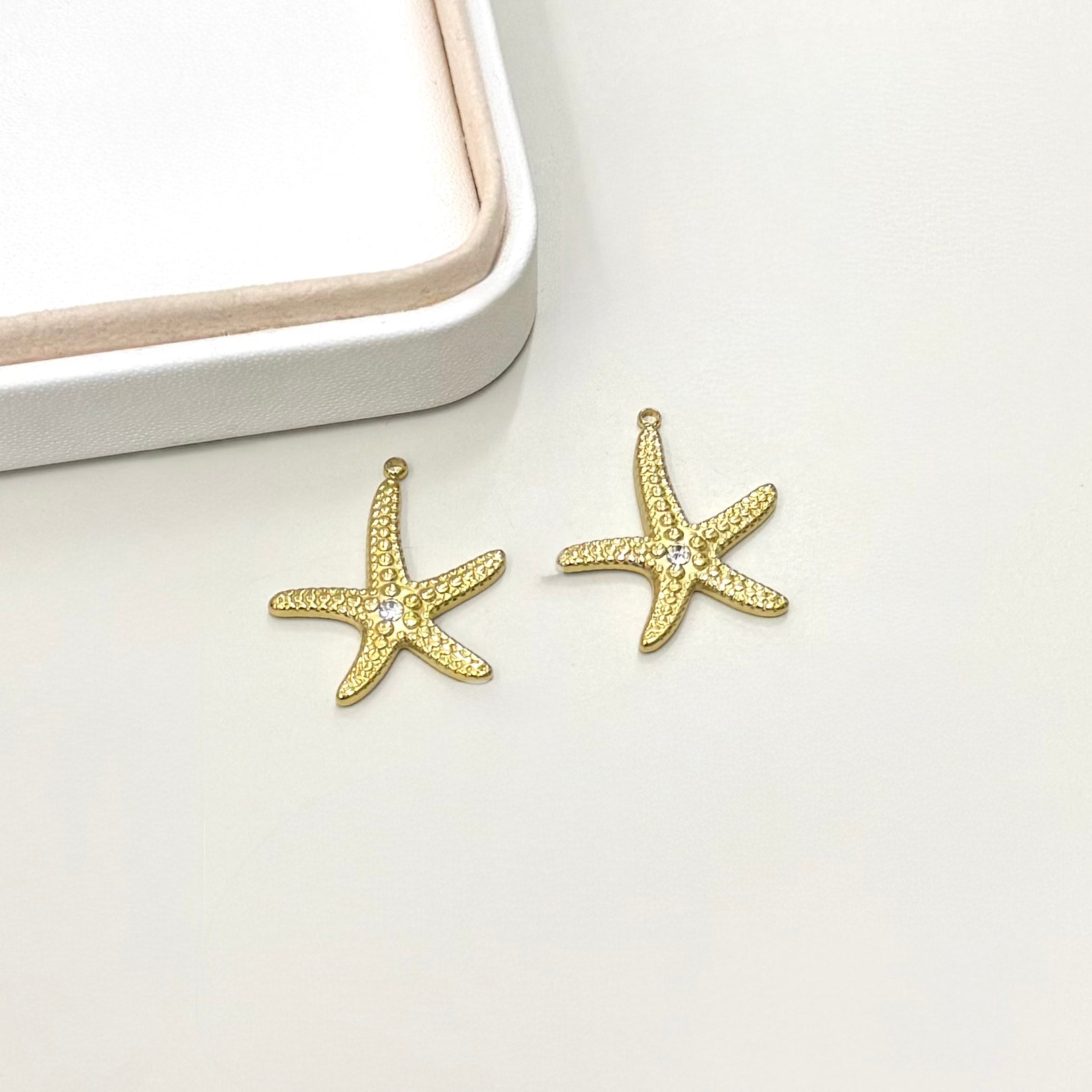 COLGANTE ESTRELLA DE MAR | BAÑO DE ORO Y CIRCON