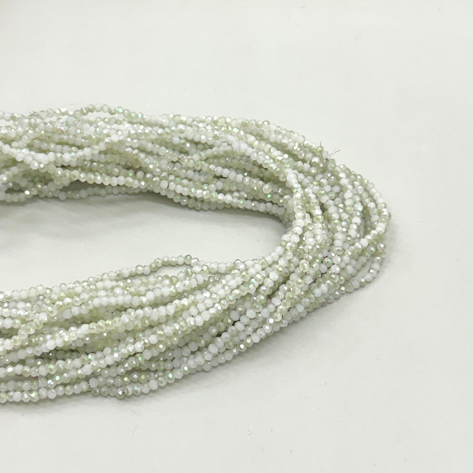 CRISTAL CHATO | 2.6MM | BI COLOR BLANCO OPALESCENTE Y TORNASOL
