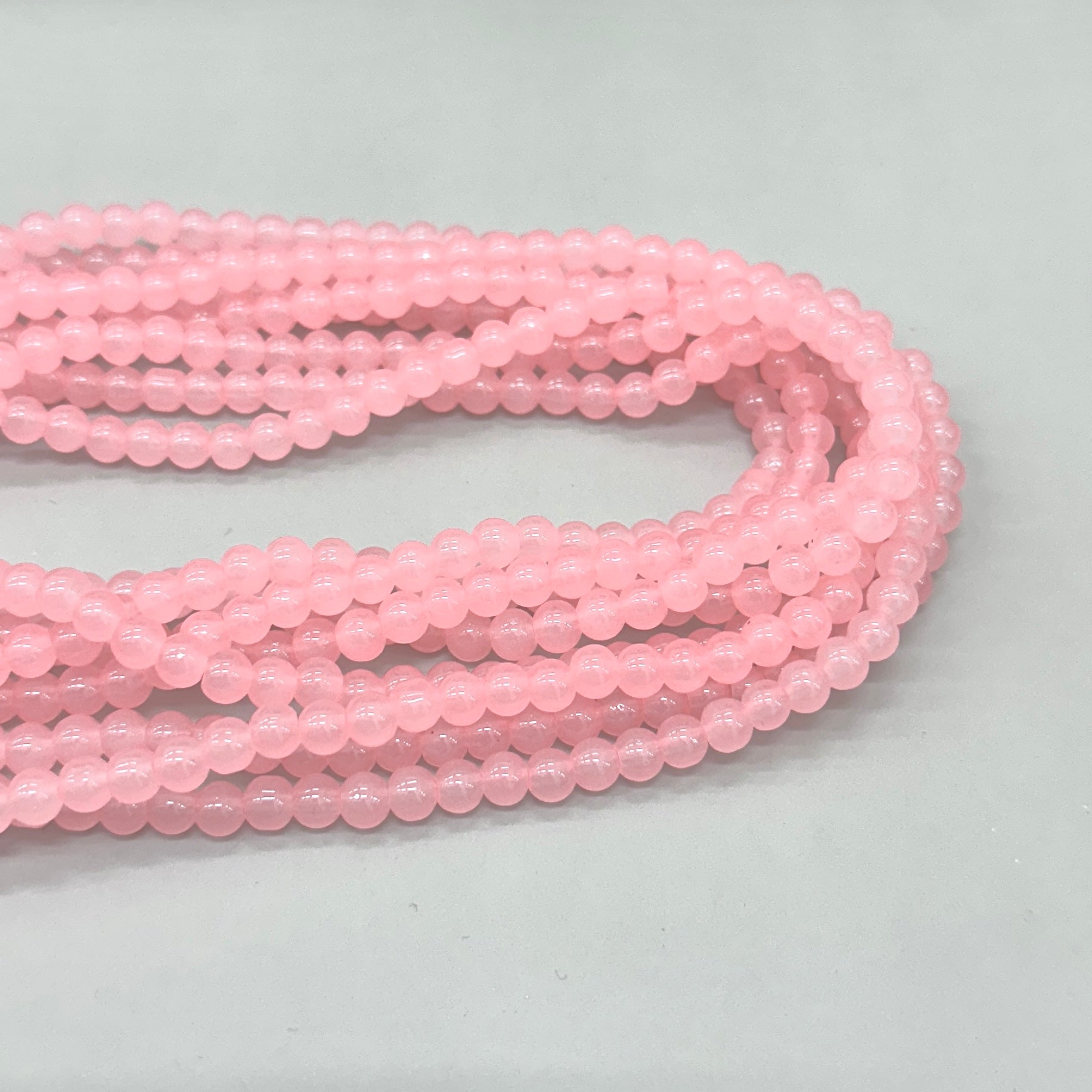 PERLA DE VIDRIO | 6MM | ROSADO TRASLÚCIDO