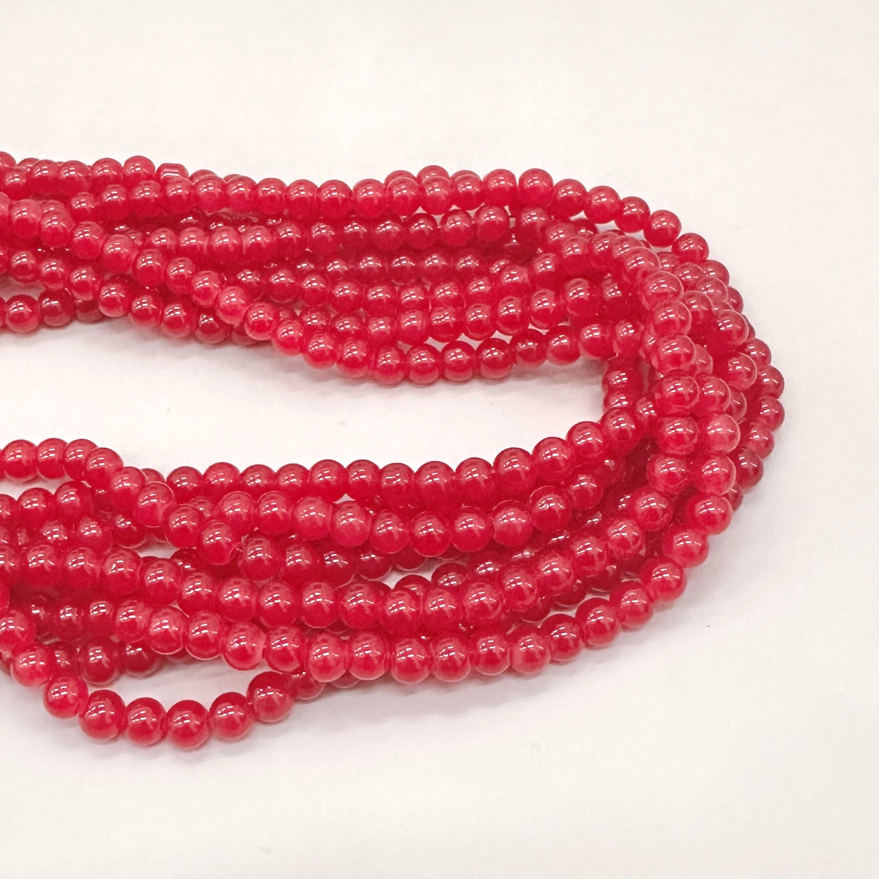 PERLA DE VIDRIO | 6MM | GUINDA TRASLÚCIDO