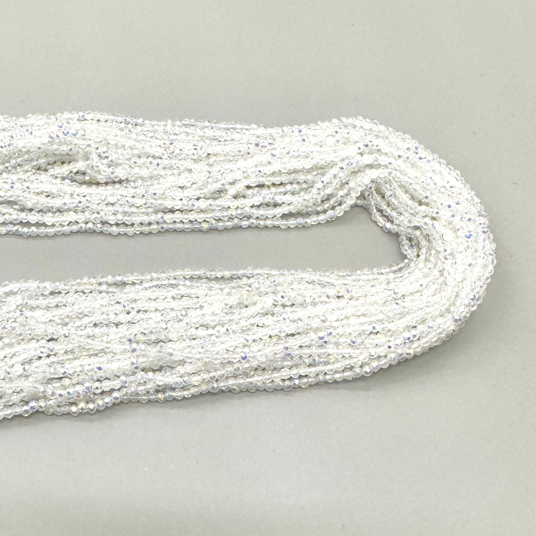 CRISTALES MINERALES FACETADO | BLANCO TRASLUCIDO TORNASOL