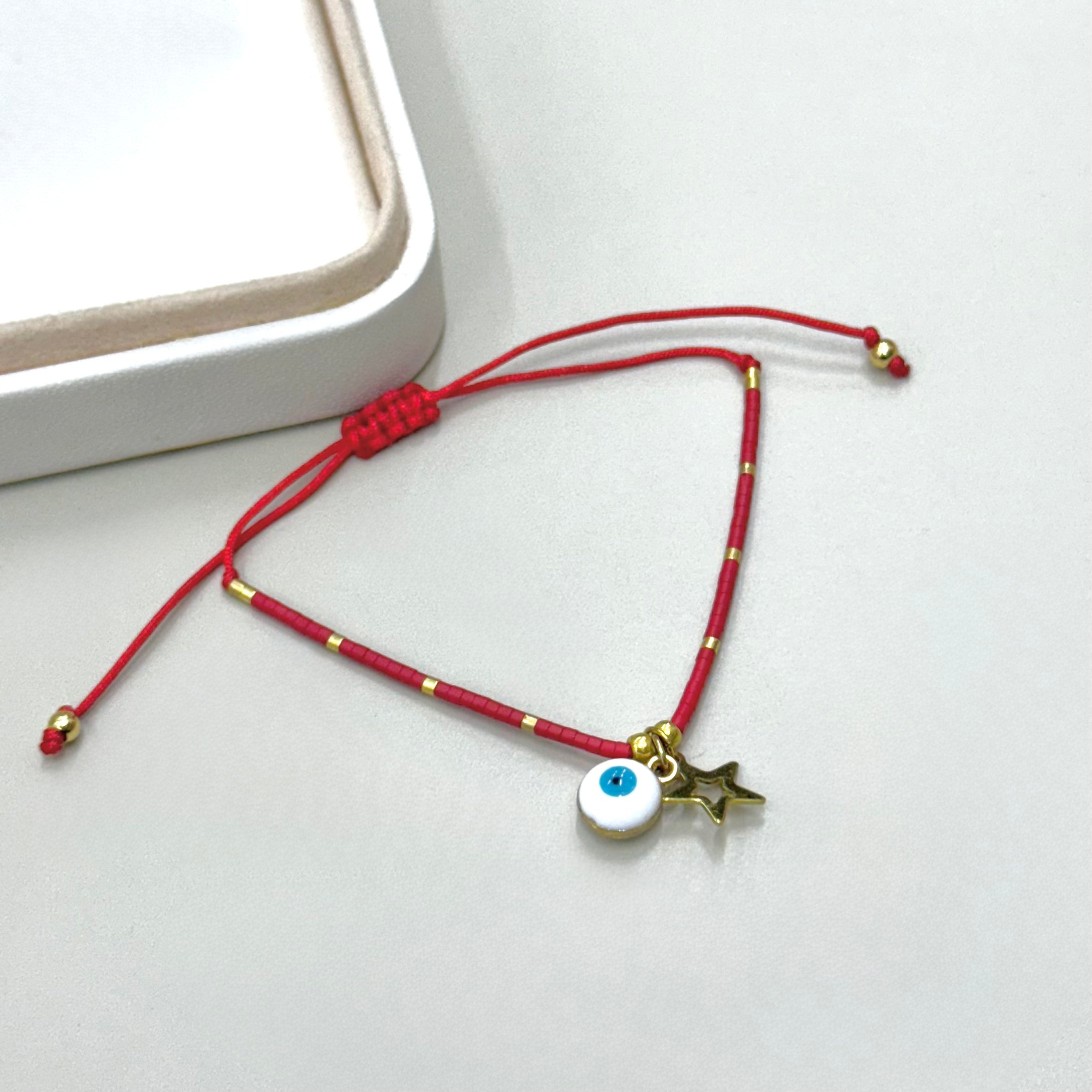 PULSERA ROJA ESTRELLA Y OJITO | LUNAM