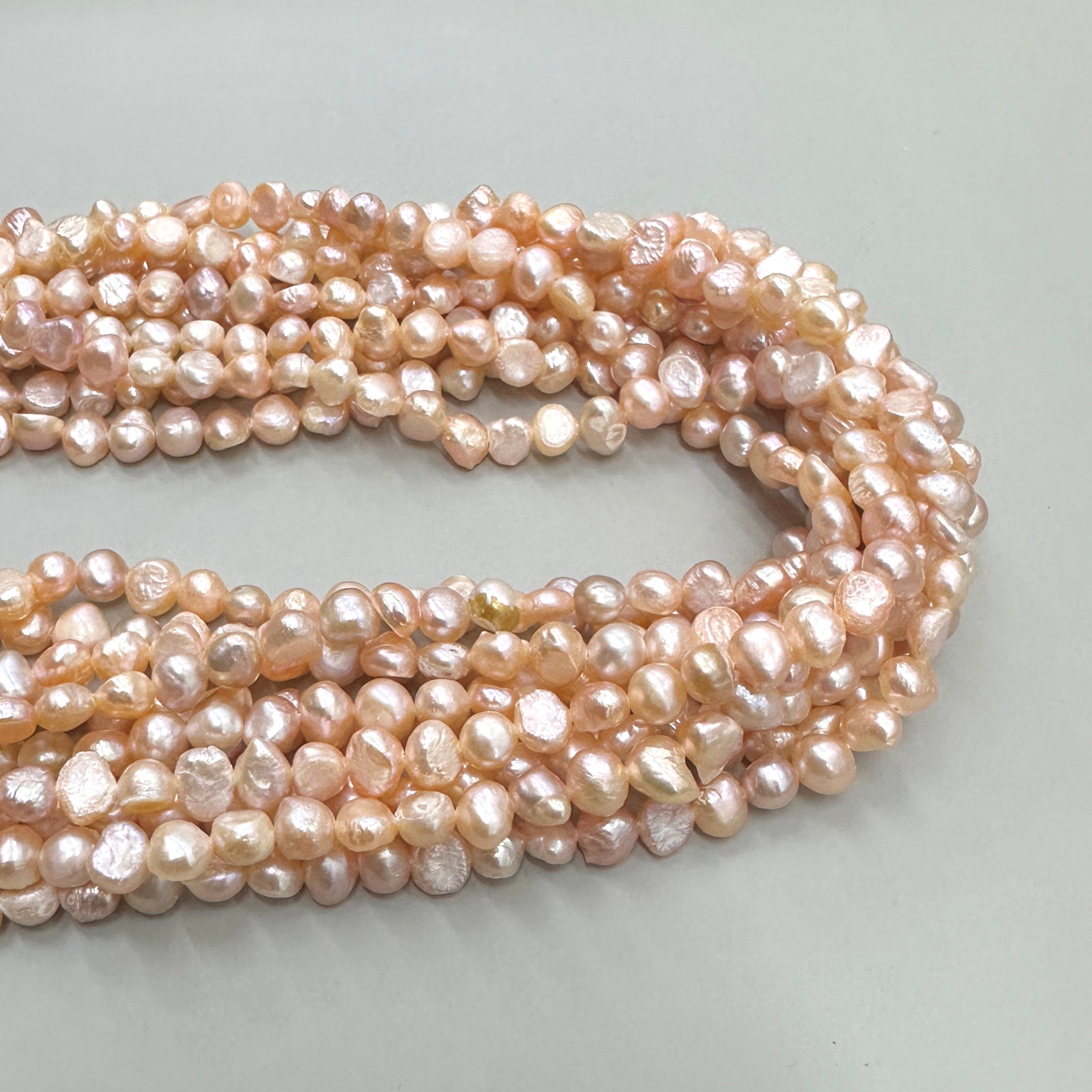 PERLA DE RÍO IRREGULAR APLANADA | MIX DAMASCO | 6MM