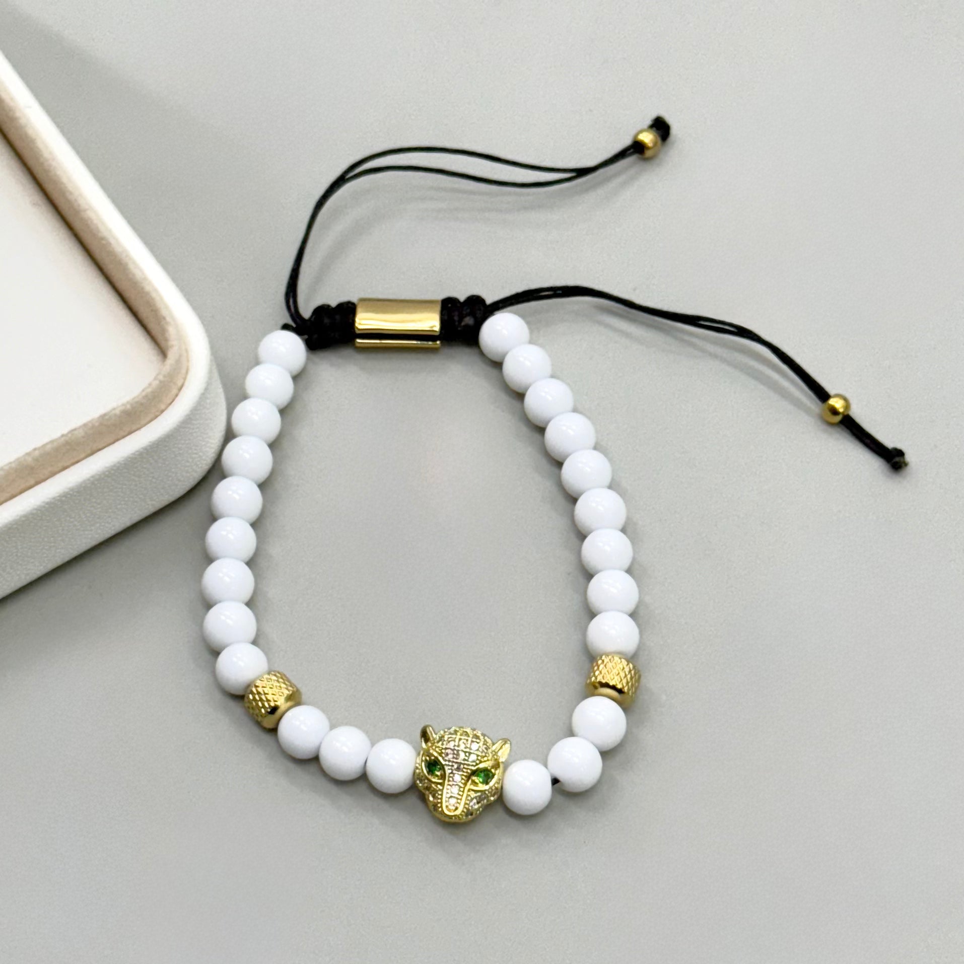 PULSERA HILO | CABEZA LEOPARDO OJOS VERDES