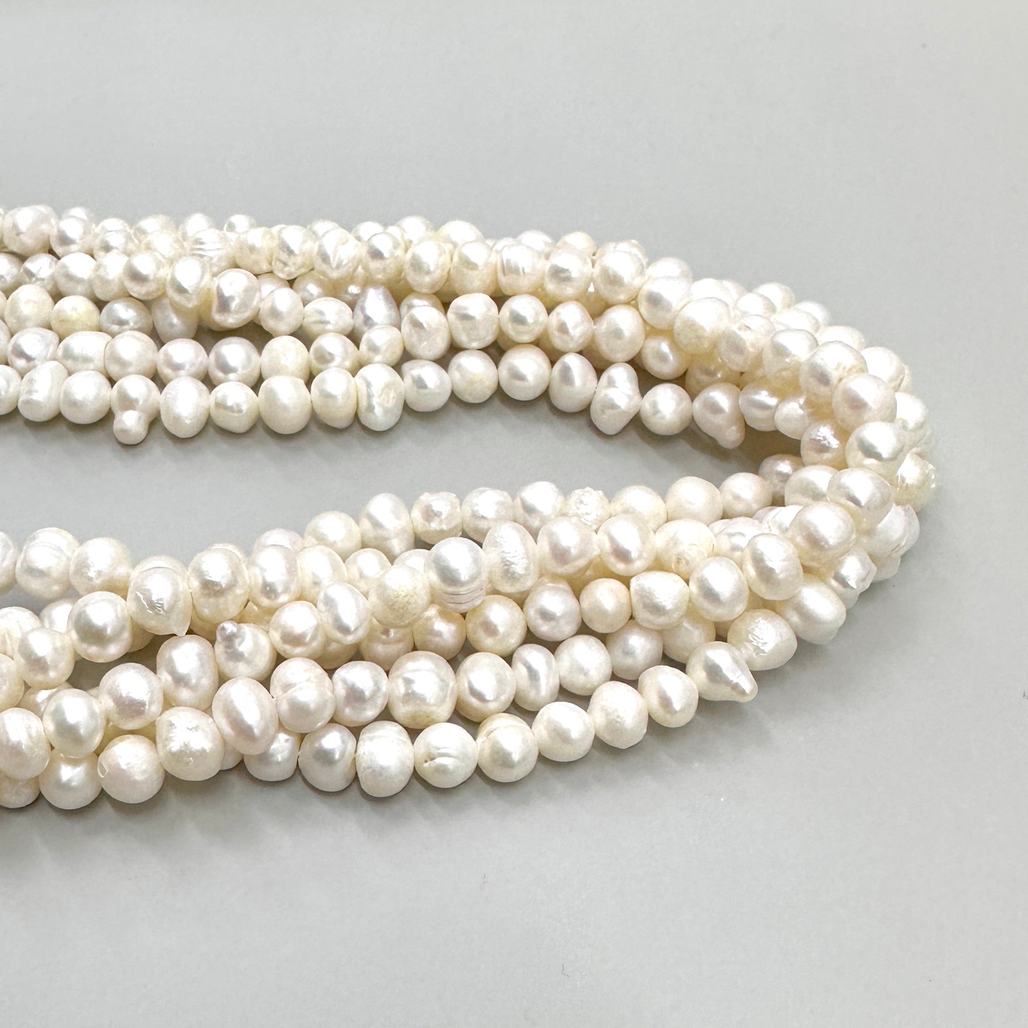 PERLA DE RÍO IRREGULAR BLANCA | 7MM