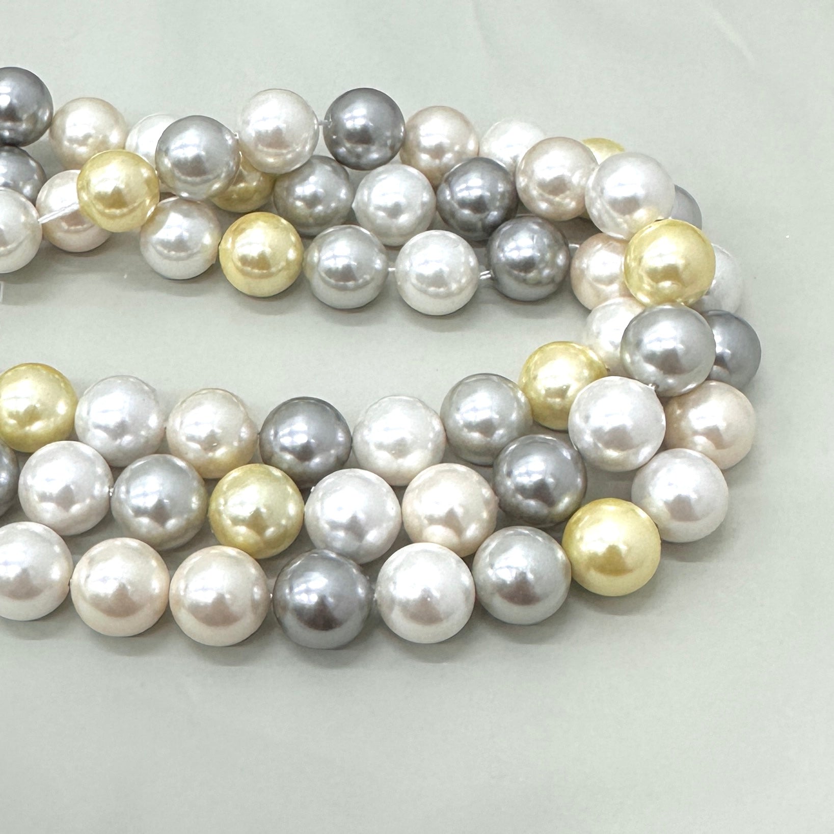 PERLA SHELL | 12MM | MIX GRIS BLANCO CREMA Y AMARILLO