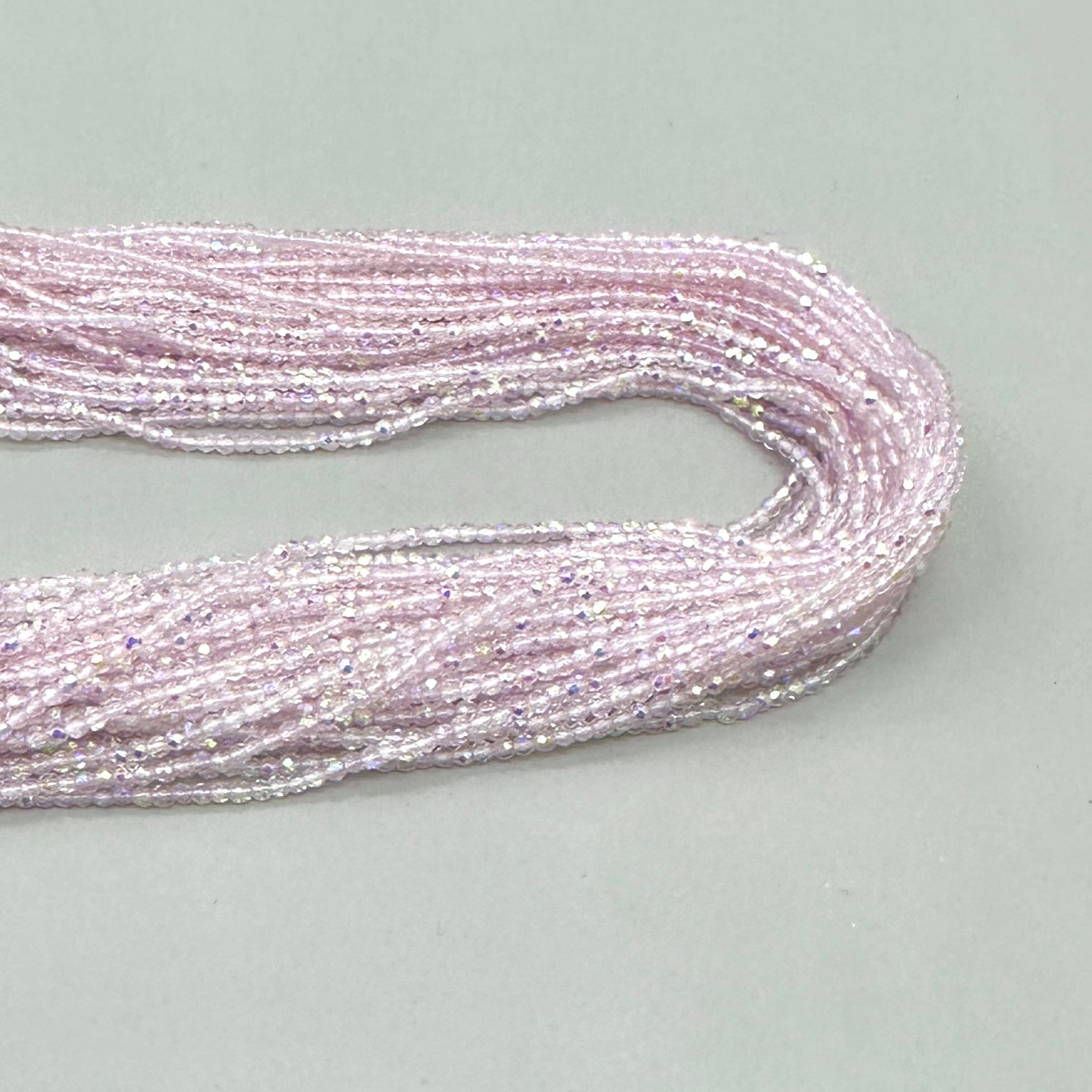 CRISTALES MINERALES FACETADO | ROSA PALIDO TRASLUCIDO TORNASOL