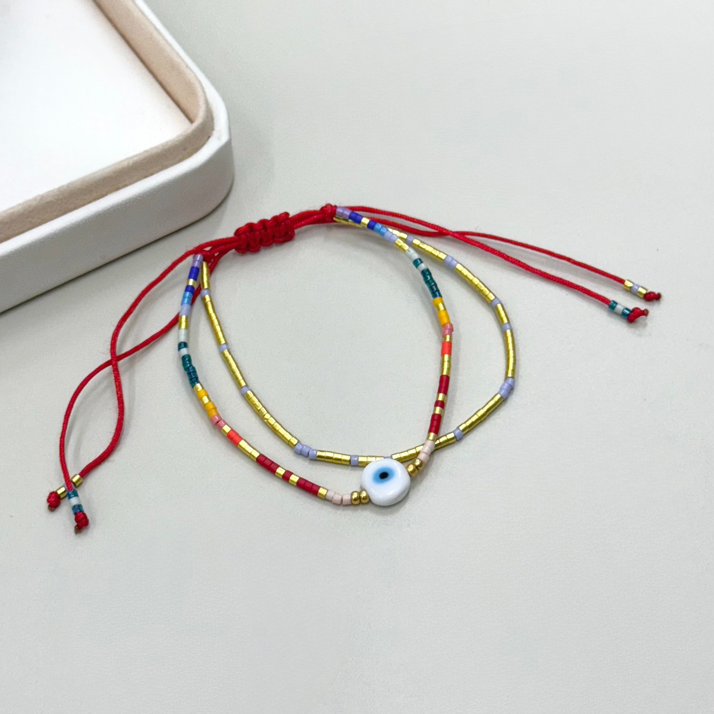 PULSERA DOBLE MIX COLORES  OJITO | LUNAM