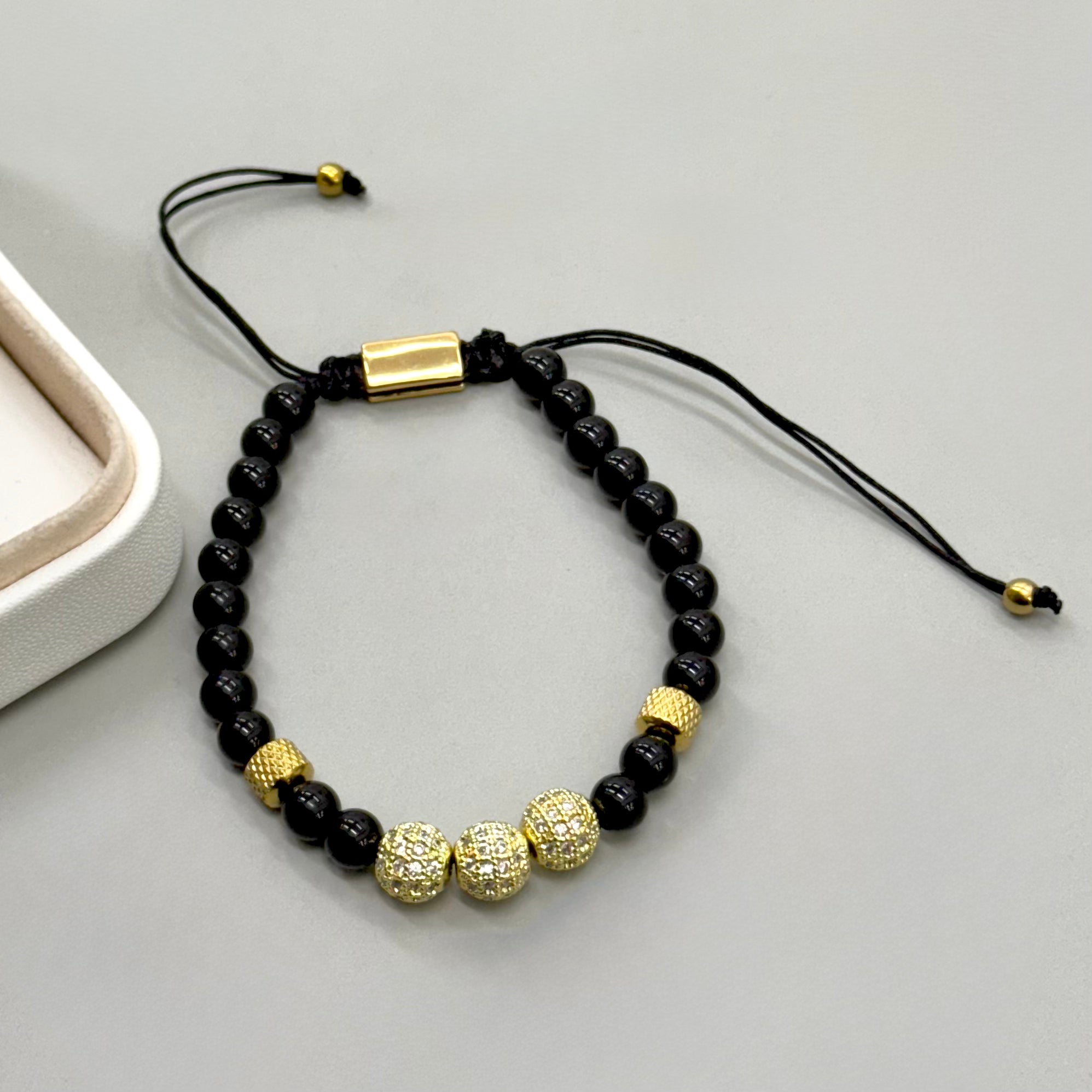 PULSERA HILO | TRES ESFERAS CON STRASS
