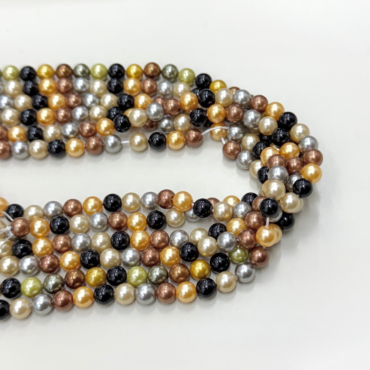 PERLA SHELL | 6MM | MIX GRIS DORADO NEGRO Y CAFE