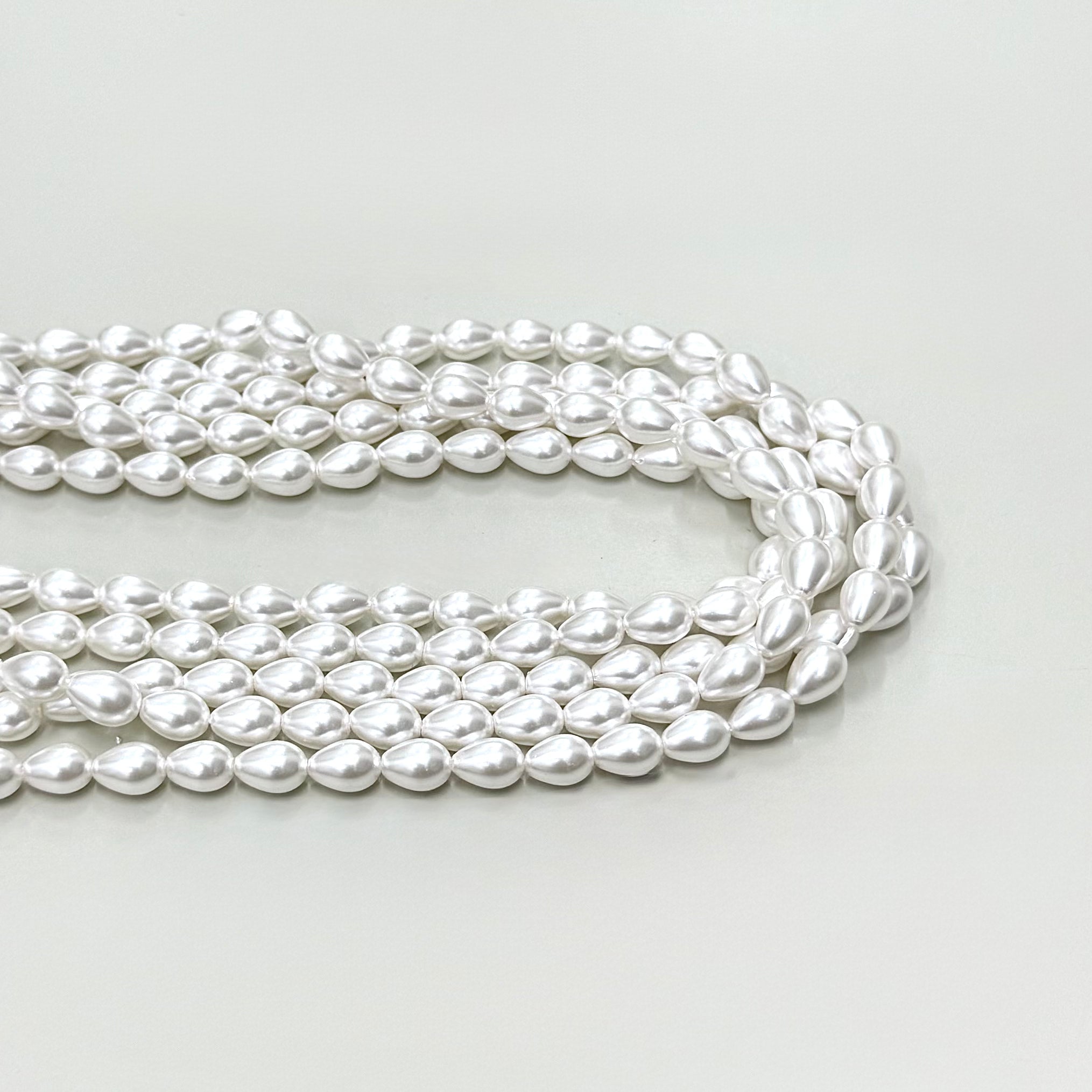 PERLA SHELL | GOTA CHAMPAGNE