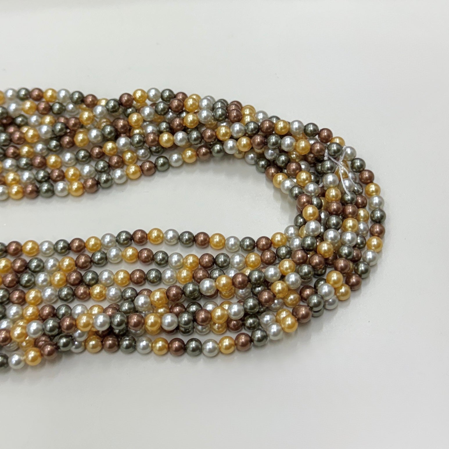 PERLA SHELL | 4MM | VERDE AMARILLO PLATEADO CAFE